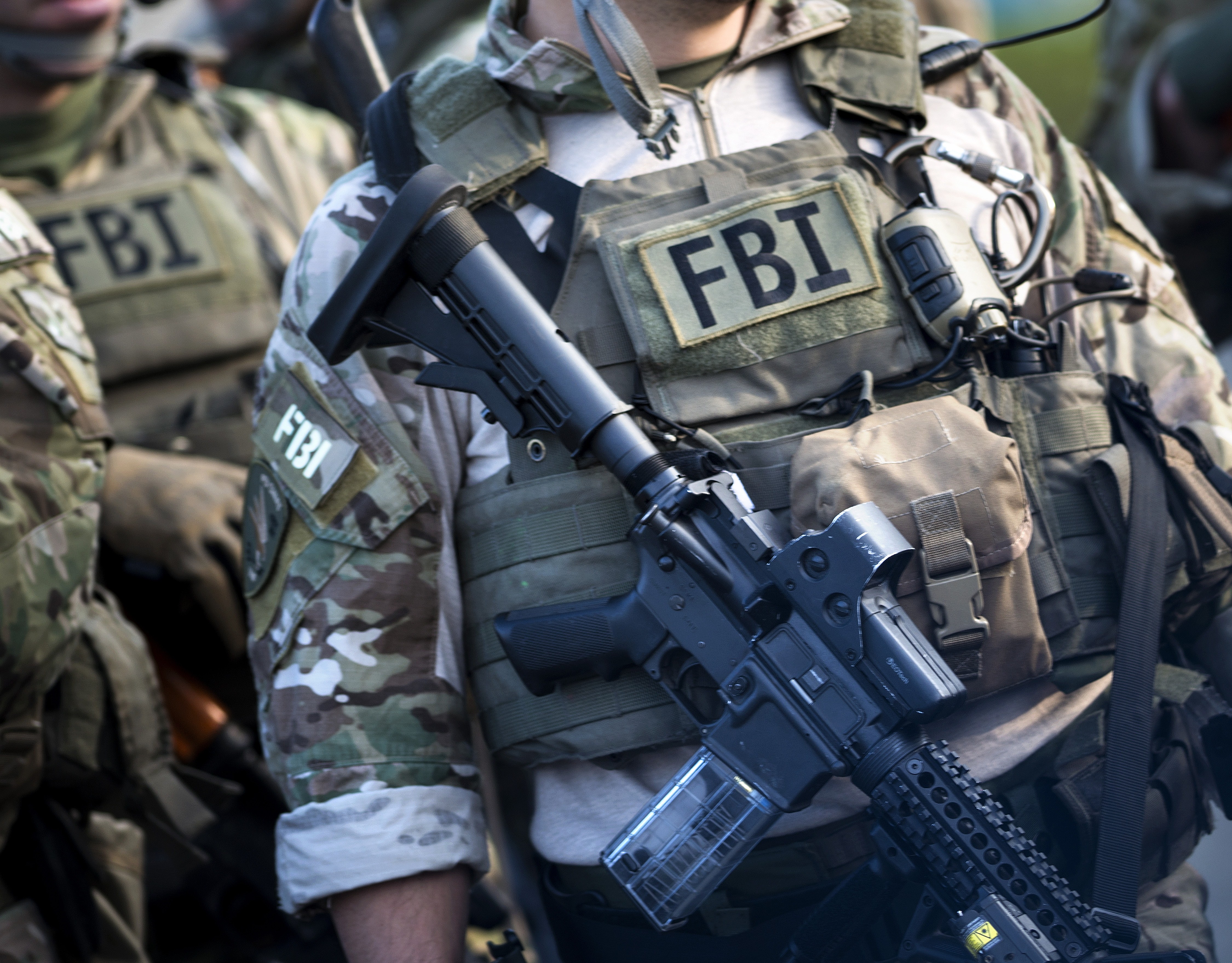 Members of a Federal Bureau of Investigation SWAT team are seen during an FBI field training exercise at the Landmark Mall on May 2, 2014, in Virginia. (BRENDAN SMIALOWSKI/AFP via Getty Images)