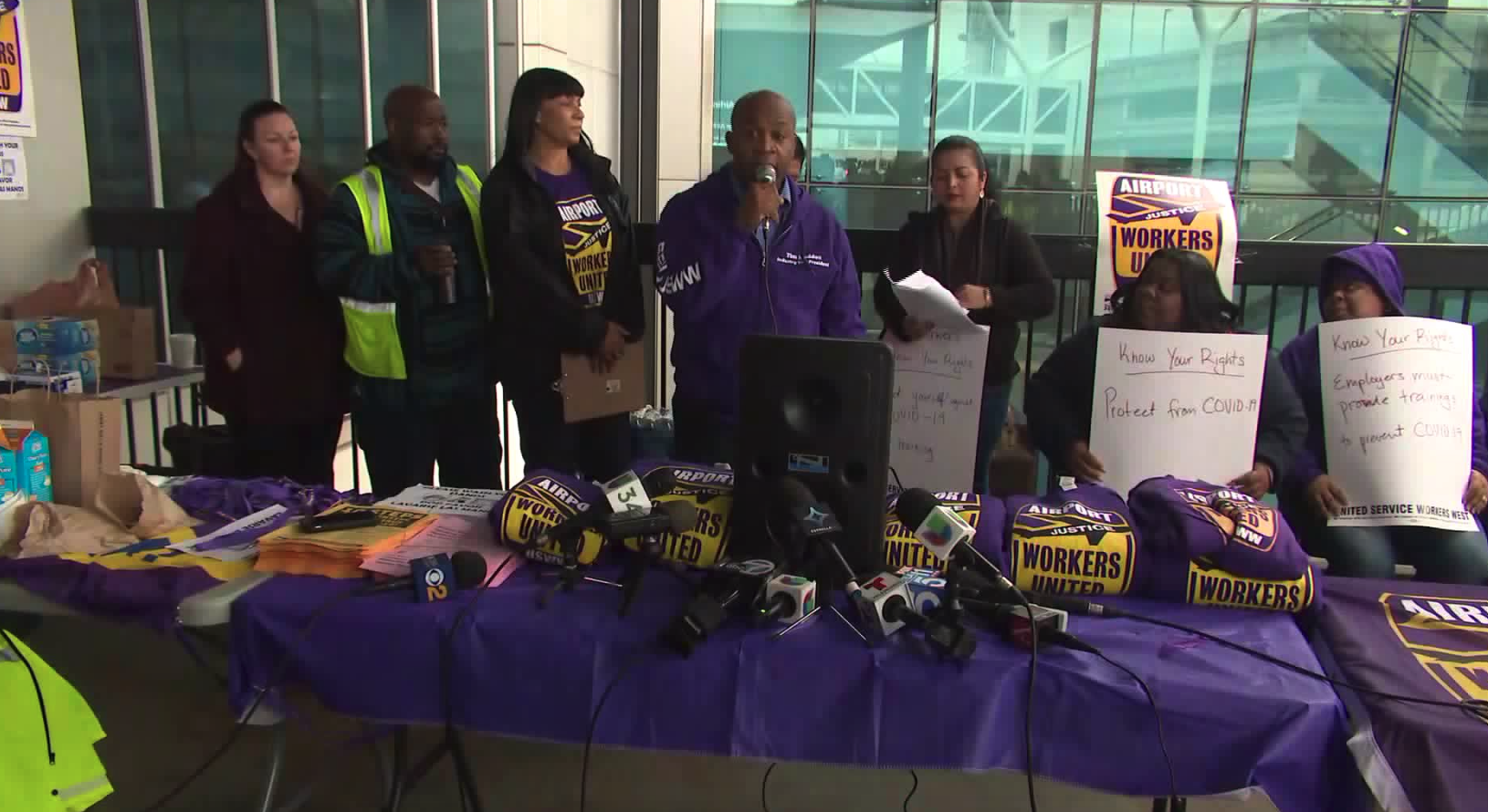 SEIU United Service Workers West members set up at the Los Angeles International Airport on March 10, 2020 demanding training and better equipment from contracting companies. (KTLA)