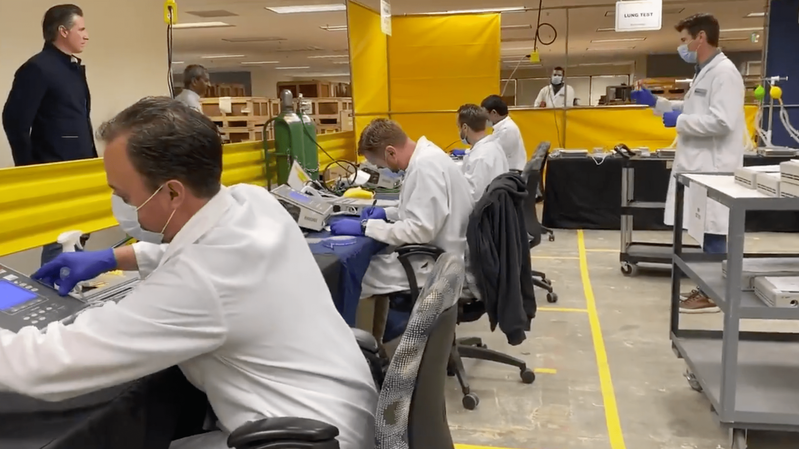 Gov. Gavin Newsom visits Bloom Energy facility in Sunnyvale where workers are refurbishing ventilators for coronavirus patients on March 28, 2020. (@CAgovernor/ Twitter)