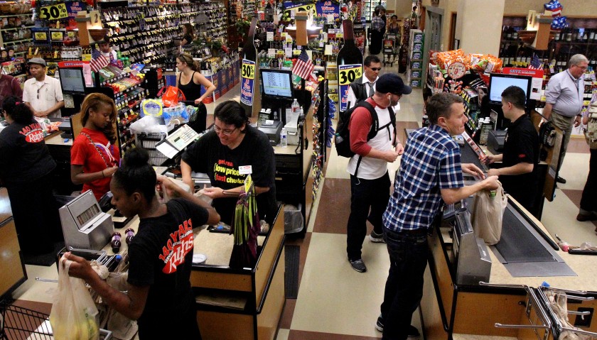 Customers shop at a grocery store in Los Angeles. (Cheryl A. Guerrero / Los Angeles Times)