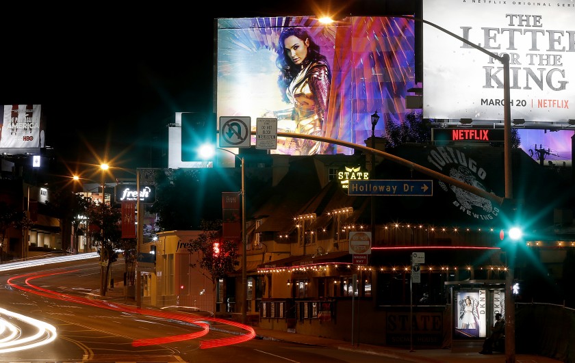 West Hollywood’s Sunset Strip is seen largely devoid of motor and pedestrian traffic on March 19, 2020. (Luis Sinco / Los Angeles Times)