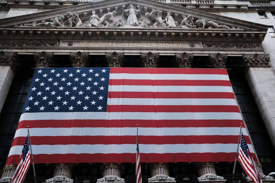 Dow futures fell 5%, hitting the "limit down" maximum allowable limit and halting futures from falling further within minutes after futures trading began Sunday. (Spencer Platt/Getty Images via CNN Wire)