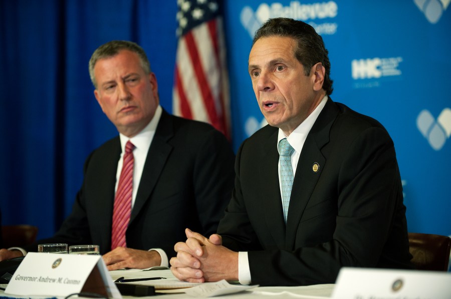 Mayor Bill de Blasio of New York City and Governor Andrew Cuomo of New York speak at a press conference in a file photo from October 23, 2014. (Bryan Thomas/Getty Images)