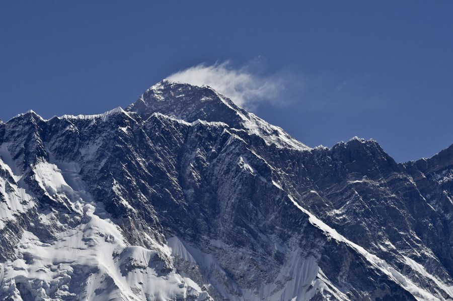 Nepal announced it is shutting down all expeditions on Mount Everest for the rest of this year's climbing season amid the worsening global pandemic. ROBERTO SCHMIDT/AFP/AFP/Getty Images)