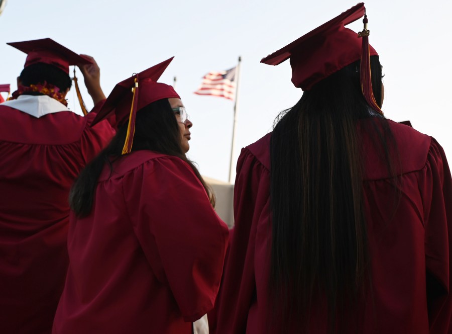 Student loan borrowers would be allowed to put off paying their federal student loan payments without penalty until September 30 under the draft version of the Senate's coronavirus stimulus bill. (Robyn Beck/AFP/Getty Images)