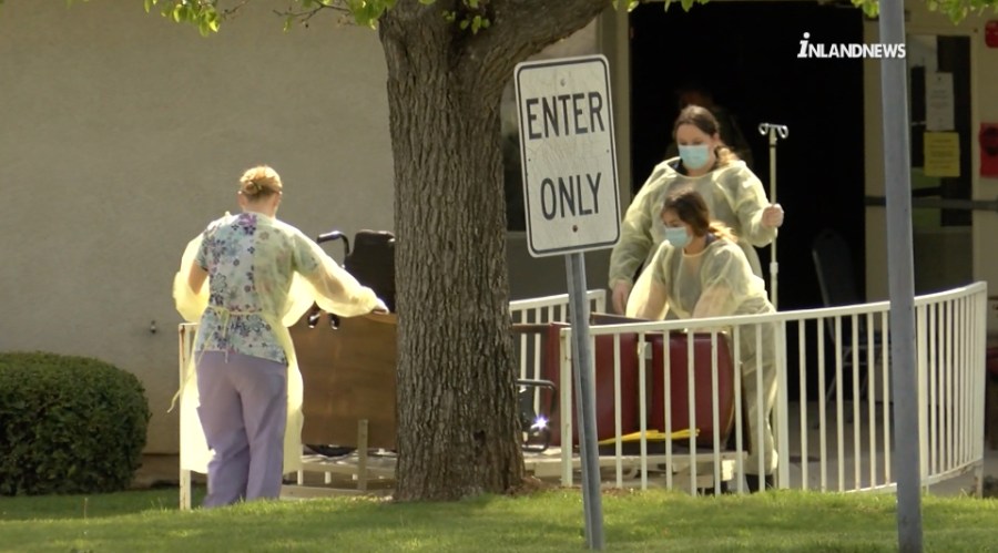 Staff remove wheelchairs from the Cedar Mountain Post Acute nursing home in Yucaipa after one death and 12 COVID-19 cases were confirmed among its residents on March 28, 2020. (Inland News)