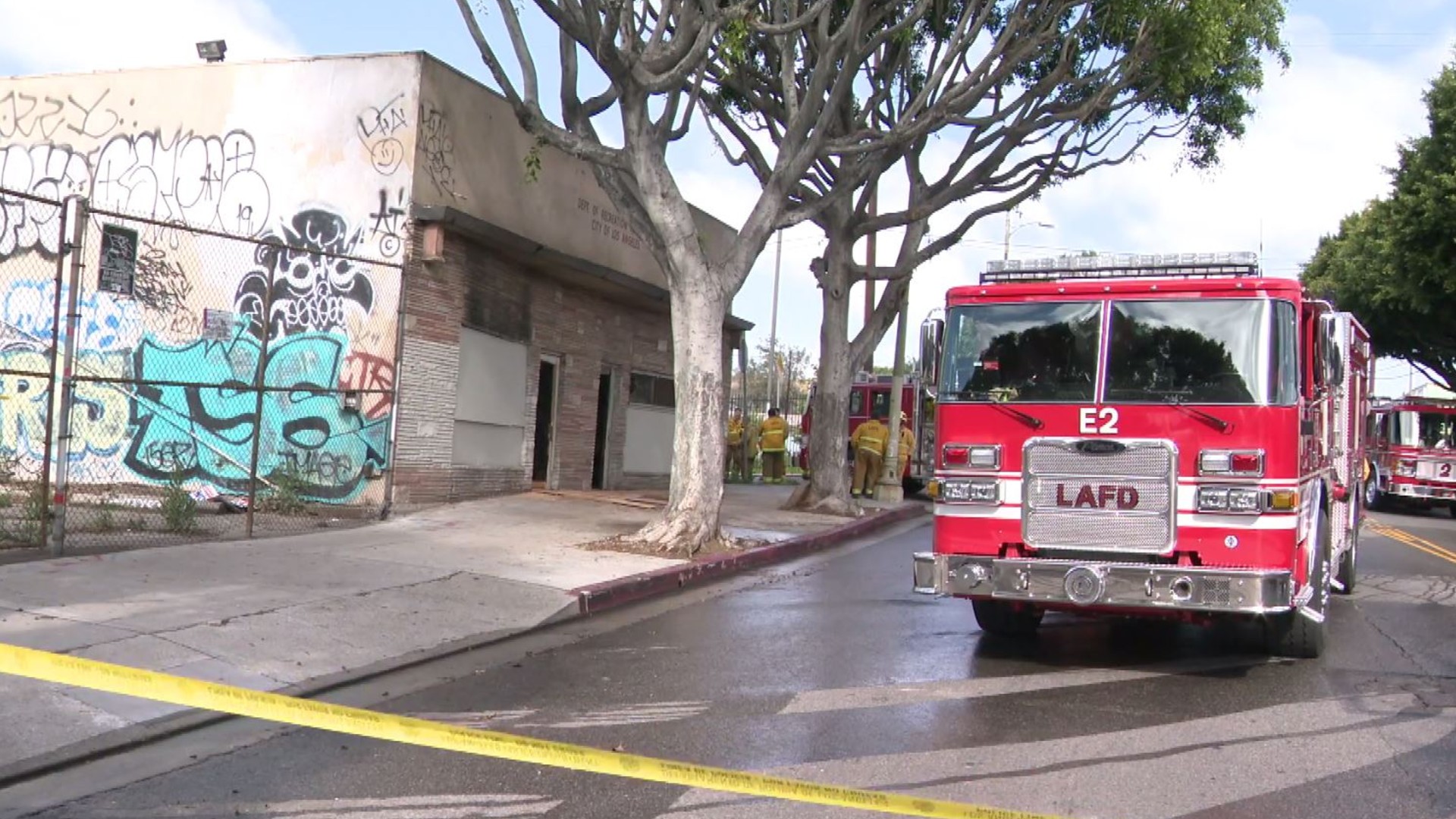 Los Angeles Fire Department firefighters work at the scene of a deadly commercial building fire in Boyle Heights on April 11, 2020. (KTLA)