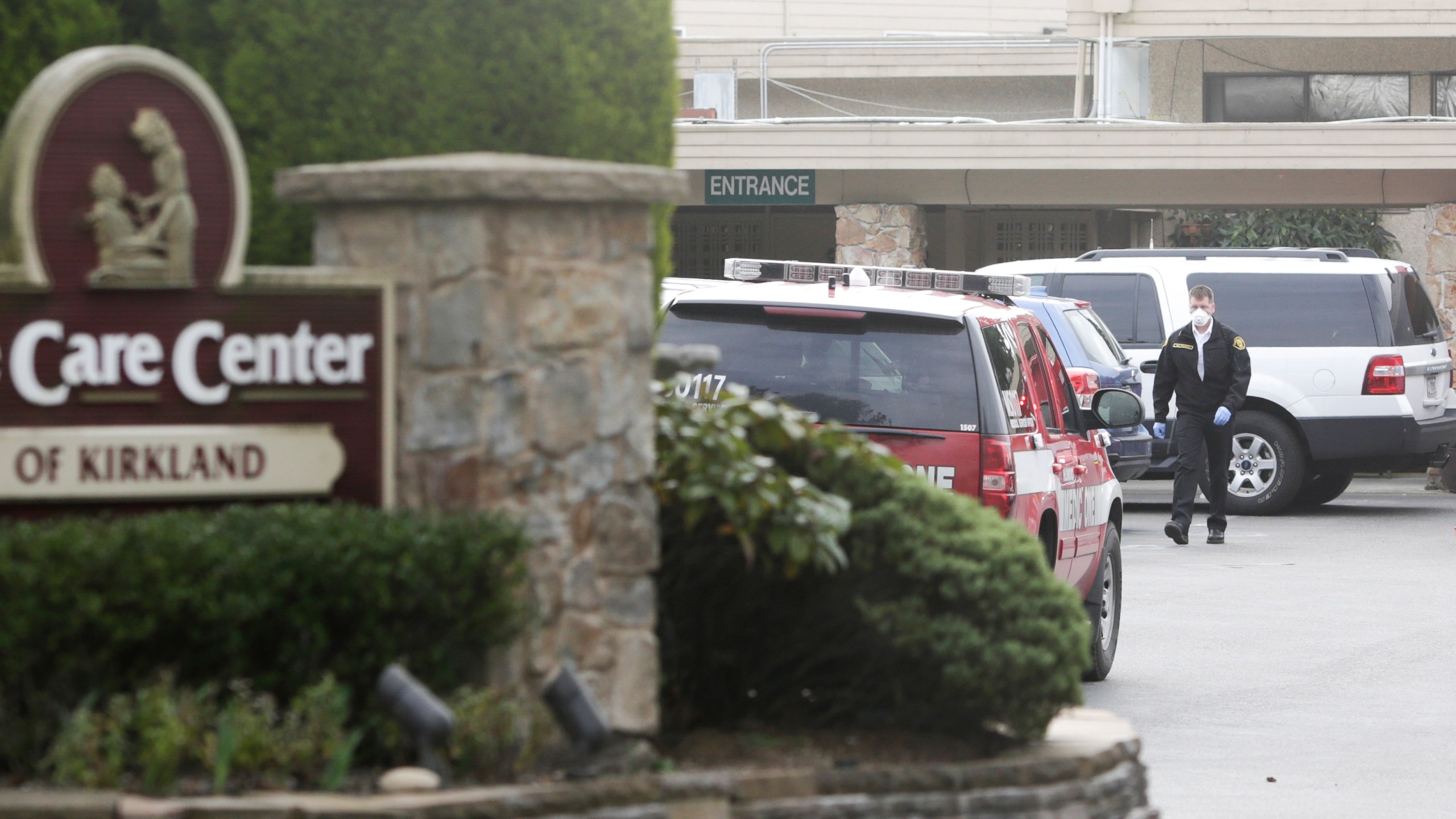 A member of the Kirkland Fire Department is pictured at Life Care Center nursing home in Kirkland, Washington on March 5, 2020. (JASON REDMOND/AFP via Getty Images)