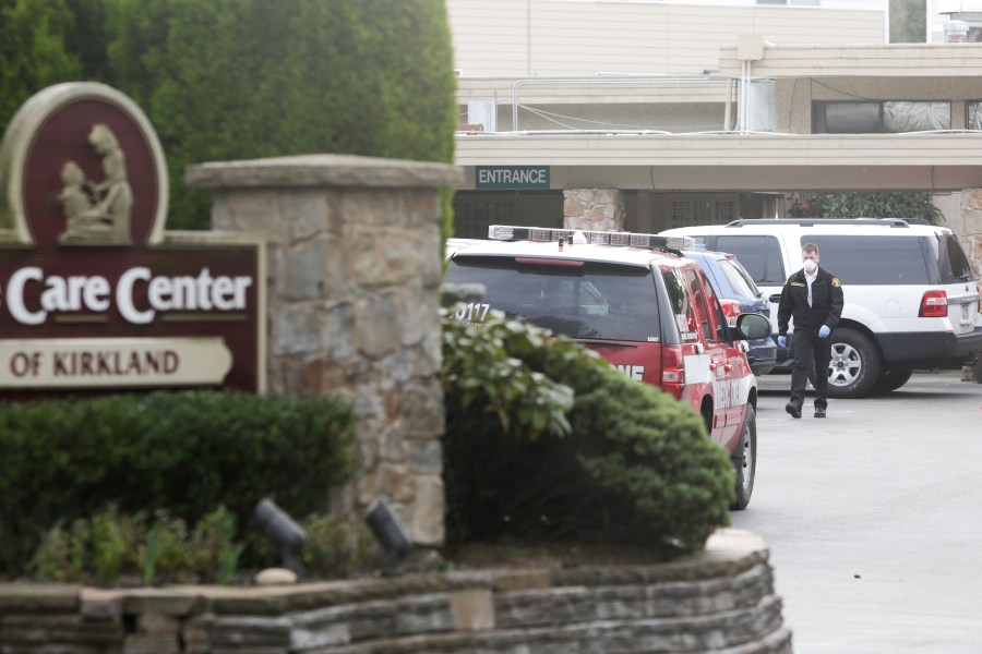 A member of the Kirkland Fire Department is pictured at Life Care Center nursing home in Kirkland, Washington on March 5, 2020. (JASON REDMOND/AFP via Getty Images)