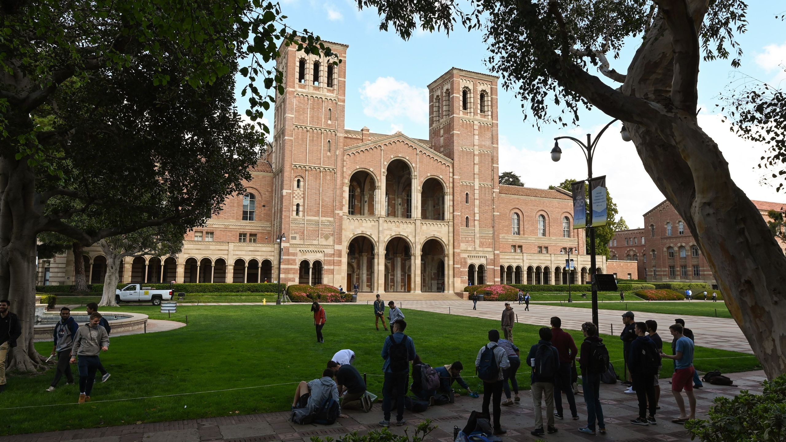 Students seen near Royce Hall on the UCLA campus on March 11, 2020. (Robyn Beck / AFP / Getty Images)