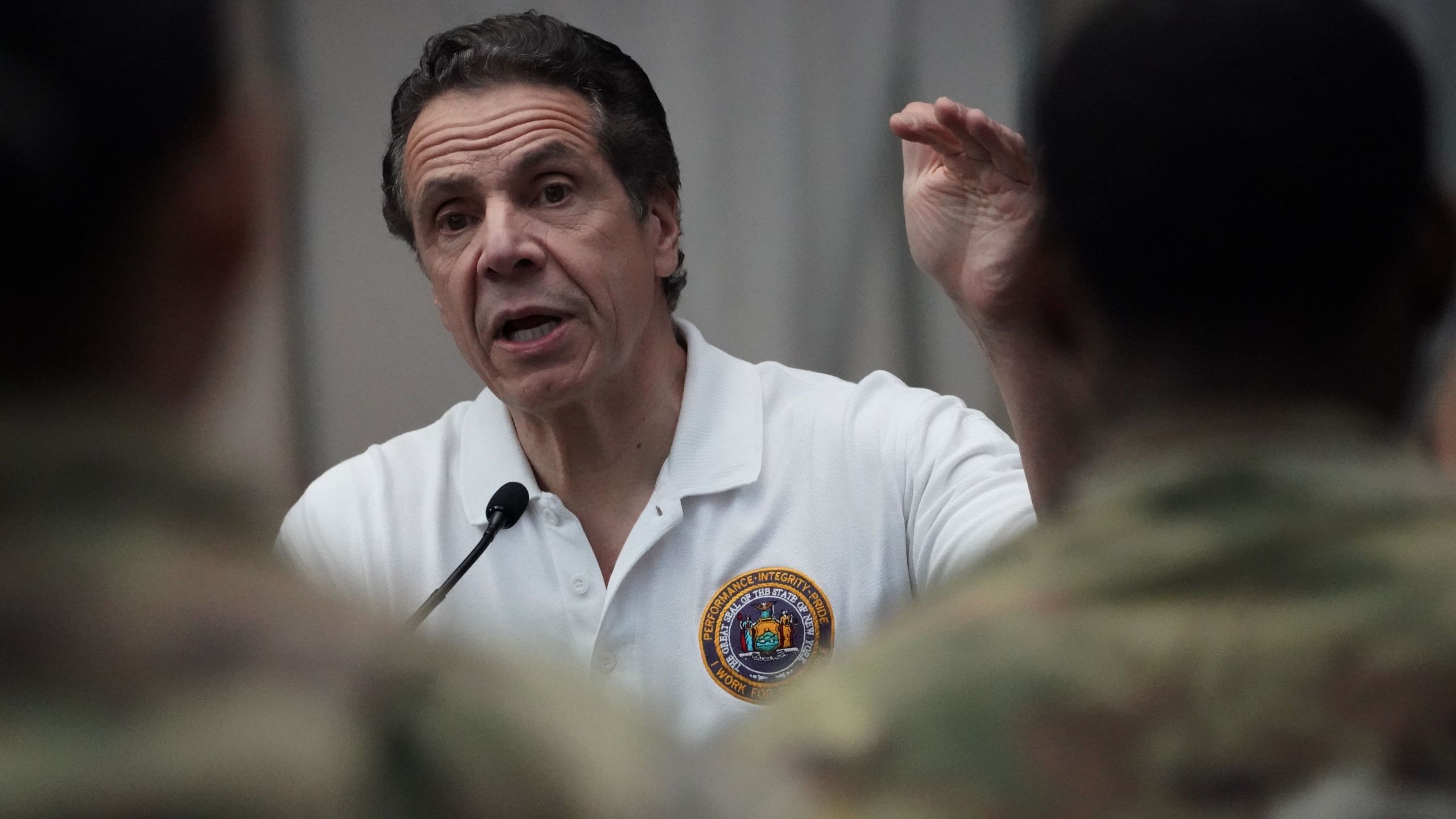 National Guard troops listen as New York Gov. Andrew Cuomo speaks to the press at the Jacob K. Javits Convention Center in New York City, on March 27, 2020. (BRYAN R. SMITH/AFP via Getty Images)