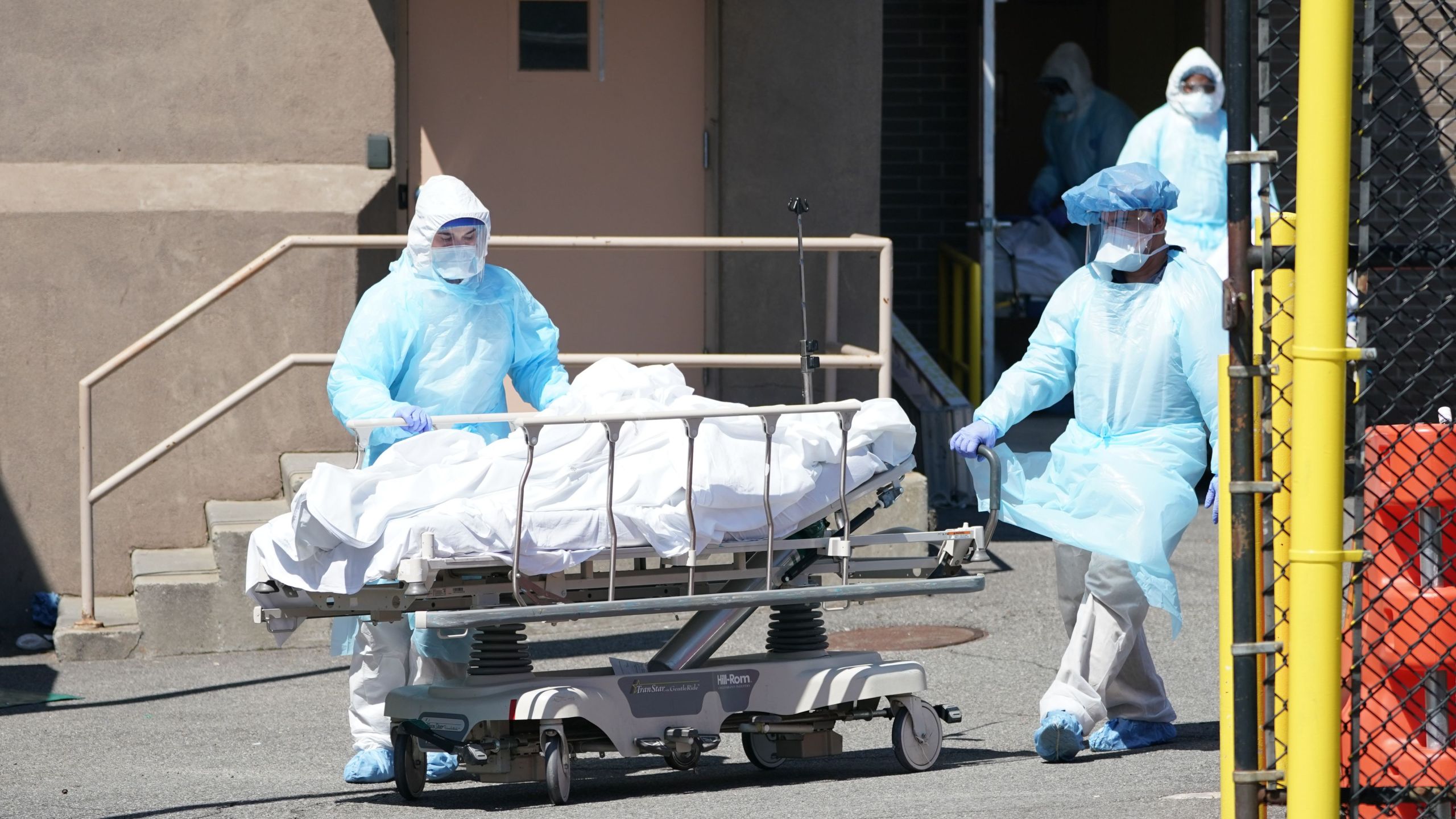 Bodies are moved to a refrigeration truck serving as a temporary morgue at Wyckoff Hospital in the Borough of Brooklyn on April 6, 2020. (BRYAN R. SMITH/AFP via Getty Images)