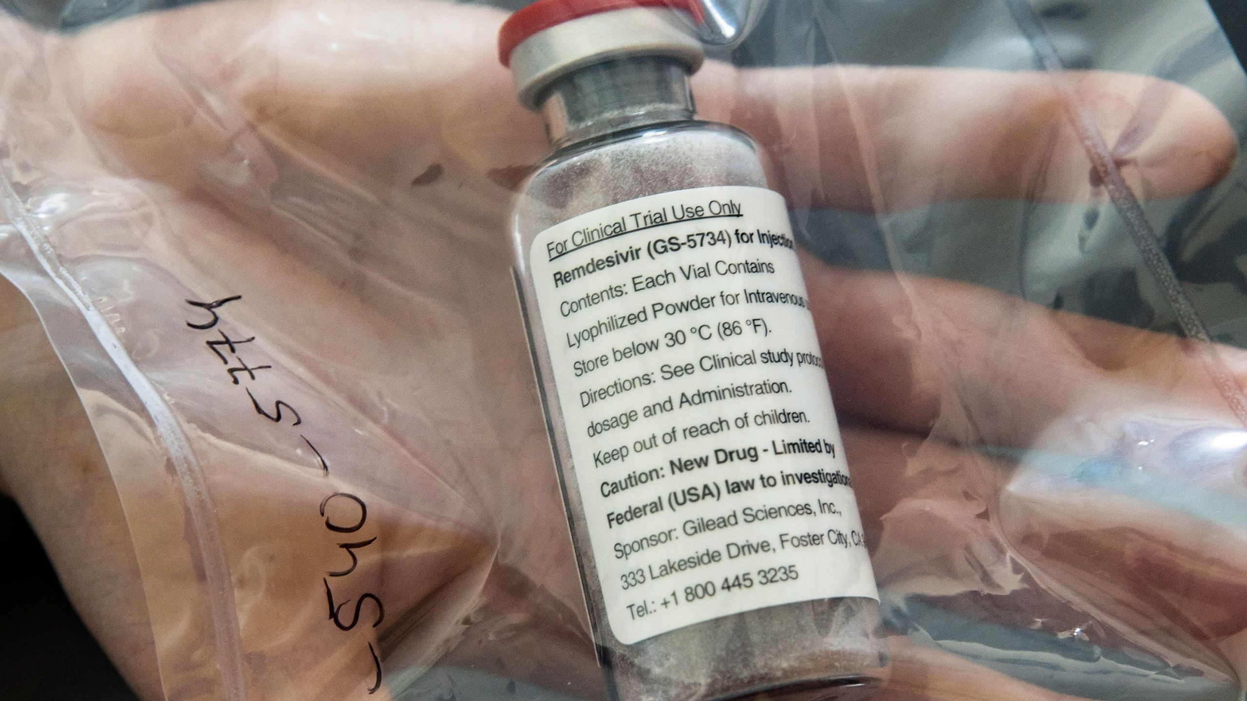 One vial of the drug Ebola drug Remdesivir is seen during a press conference about the start of a study with severely ill patients at the University Hospital Eppendorf in Hamburg, Germany on April 8, 2020. (ULRICH PERREY/POOL/AFP via Getty Images)