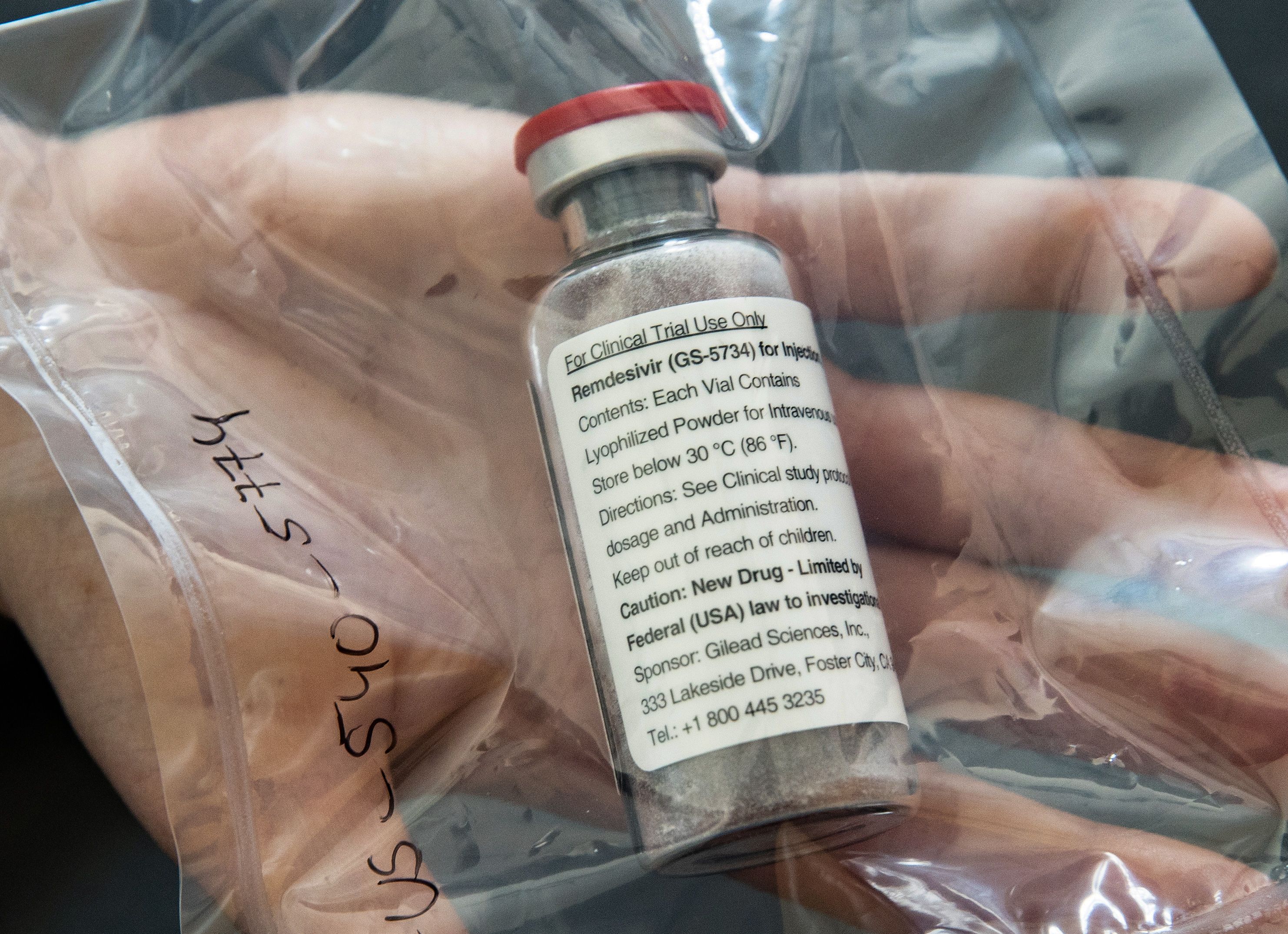 One vial of the drug Ebola drug Remdesivir is seen during a press conference about the start of a study with severely ill patients at the University Hospital Eppendorf in Hamburg, Germany on April 8, 2020. (ULRICH PERREY/POOL/AFP via Getty Images)