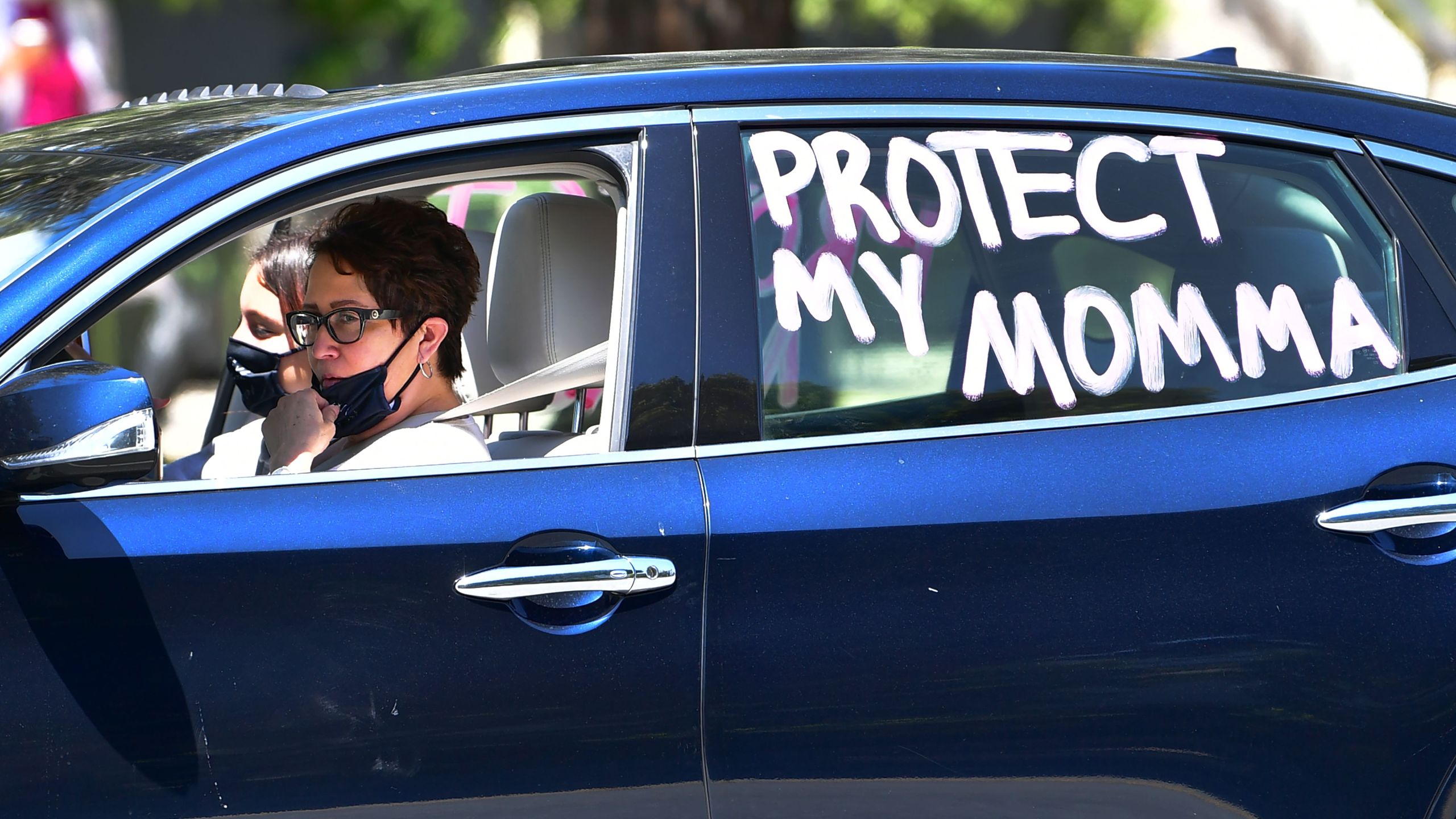 Nurses employed at Providence Saint John's Hospital and their supporters participate in a car caravan in Santa Monica, California on April 21, 2020. (FREDERIC J. BROWN/AFP via Getty Images)