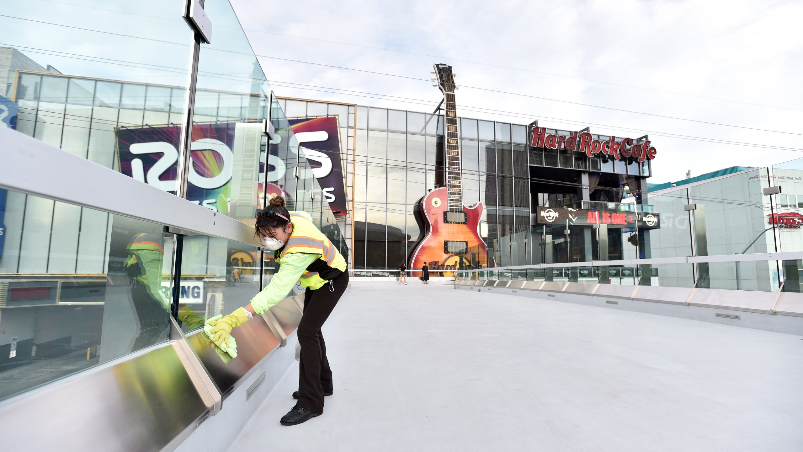 A pedestrian overpass is cleaned along the Las Vegas Strip on April 25, 2020, in Las Vegas, Nevada. (David Becker/AFP via Getty Images)