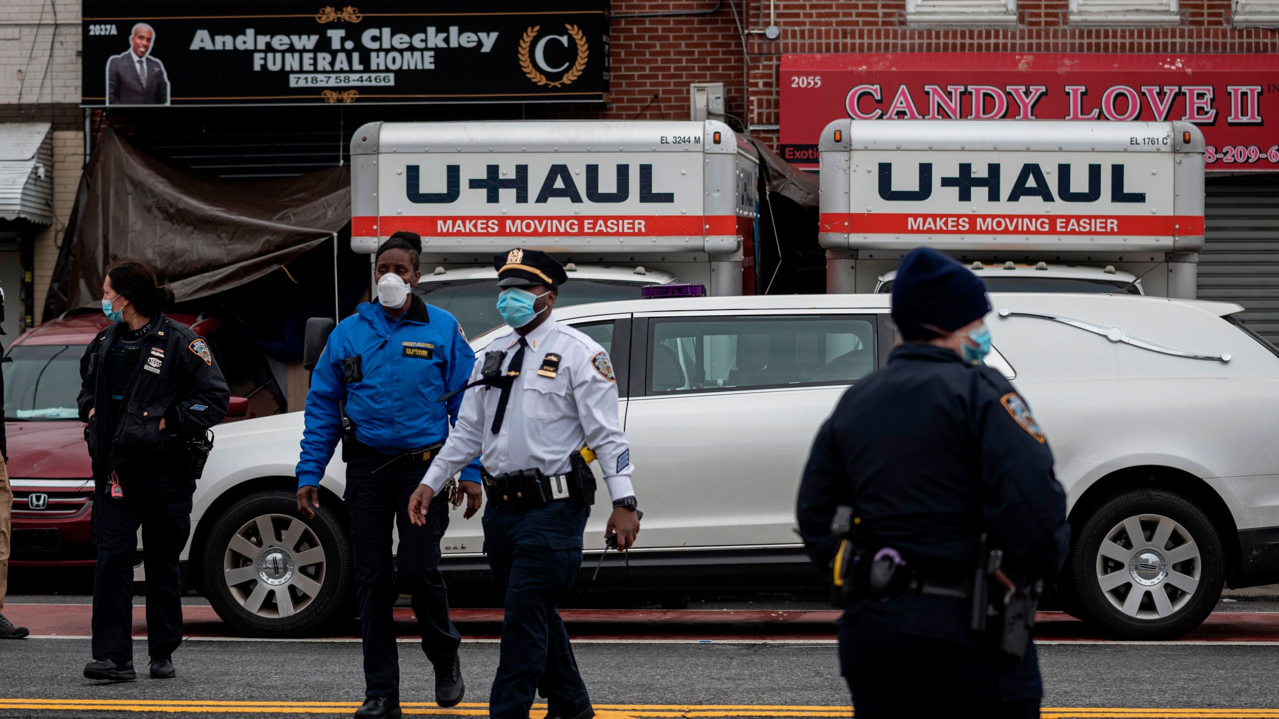 Police are seen outside a funeral home in Brooklyn on April 30, 2020 in New York City. Dozens of bodies have been discovered in unrefrigerated overflow trucks outside the Andrew T. Cleckley Funeral Home, following a complaint of a foul odor. (JOHANNES EISELE/AFP via Getty Images)