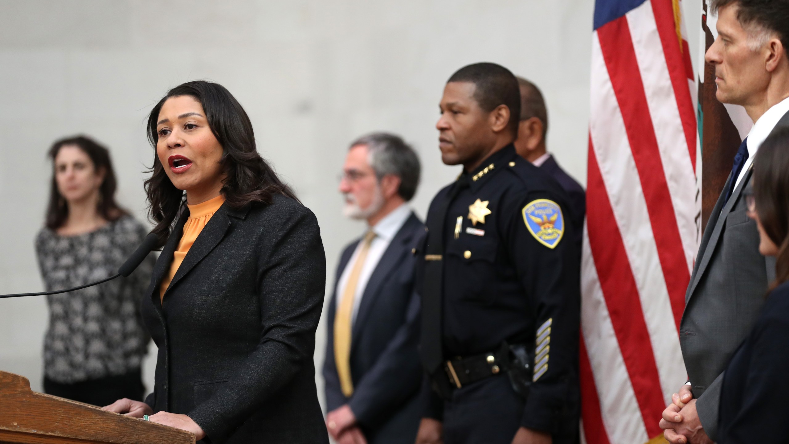 San Francisco Mayor London Breed speaks during a press conference as San Francisco police chief William Scott looks on at San Francisco City Hall on March 16, 2020, in San Francisco. (Justin Sullivan/Getty Images)