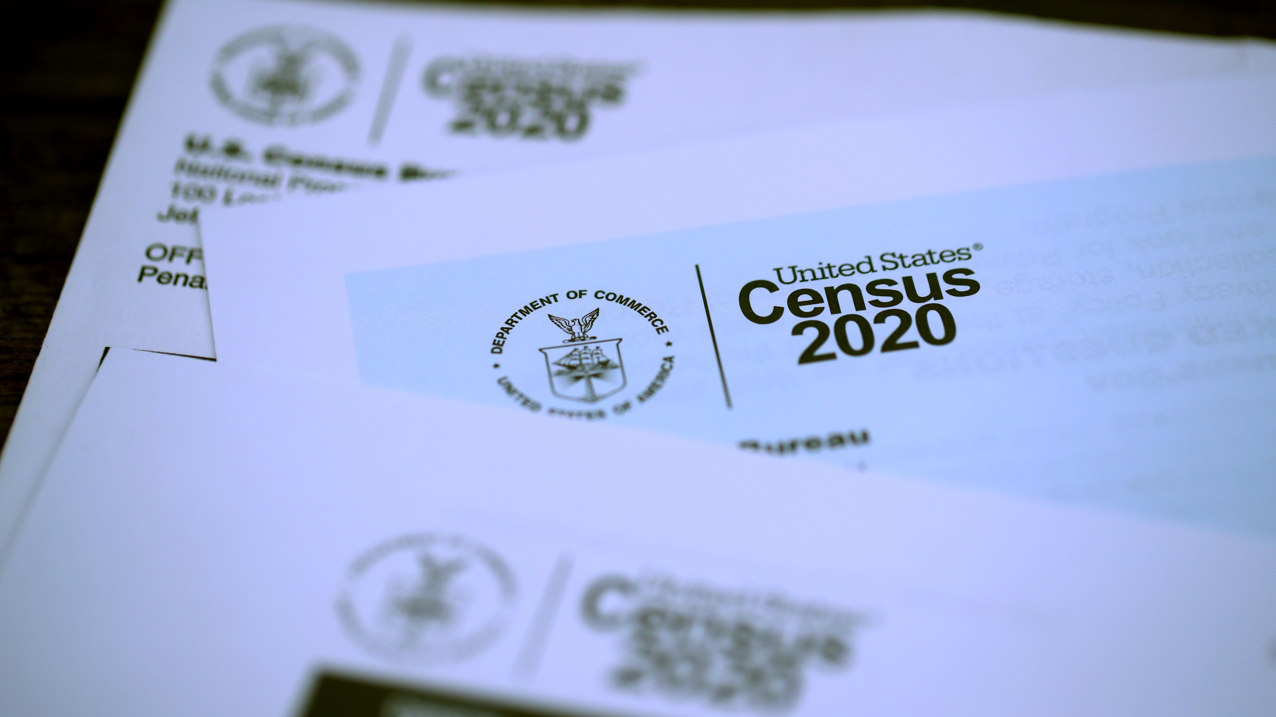 The U.S. Census logo appears on census materials received in the mail with an invitation to fill out census information online on March 19, 2020 in San Anselmo. (Justin Sullivan/Getty Images)