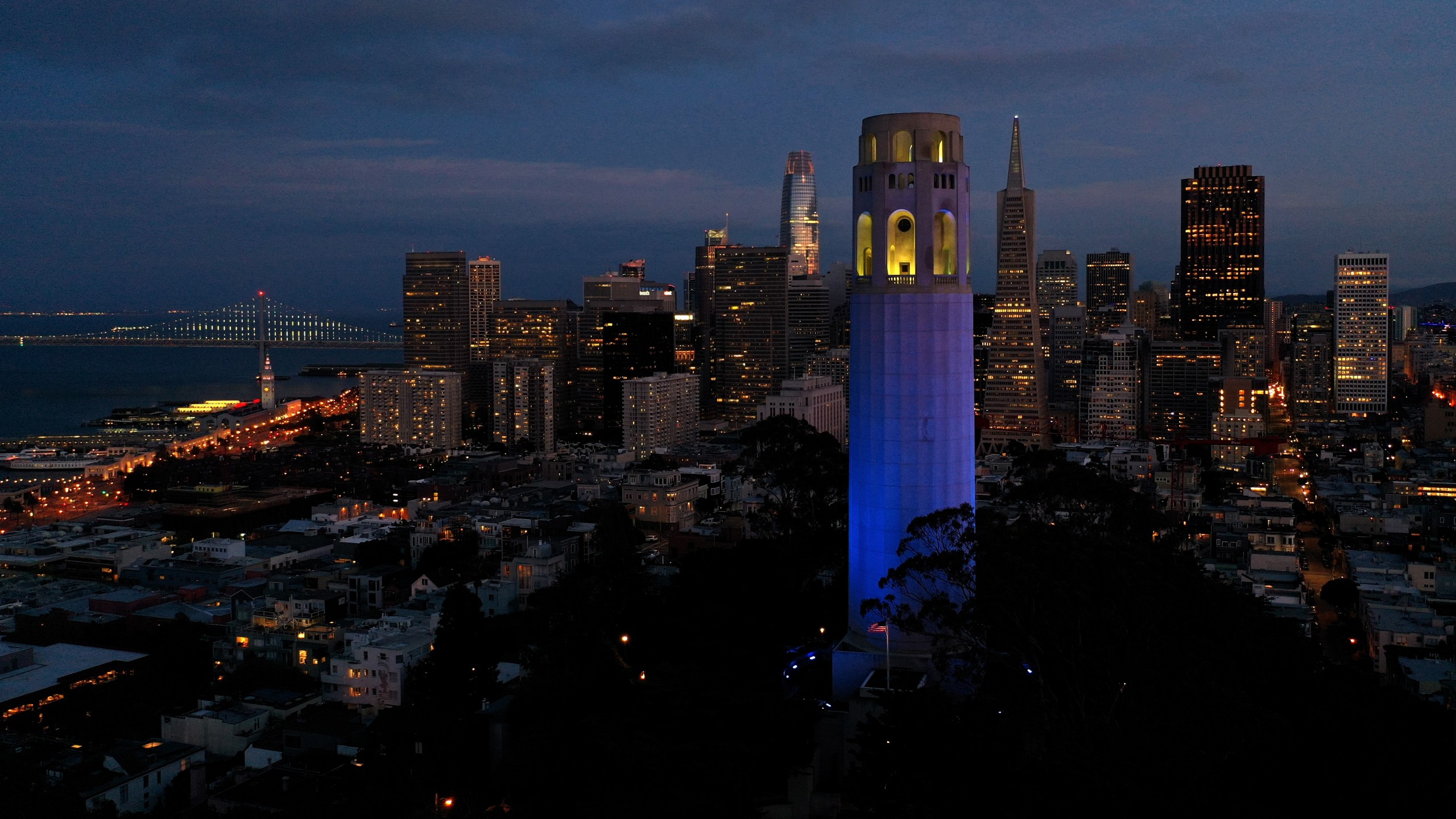 Coit Tower is lit up blue on April 9, 2020 in San Francisco. Landmarks and buildings across the nation are displaying blue lights to show support for health care workers and first responders on the front lines of the COVID-19 pandemic. (Justin Sullivan/Getty Images)