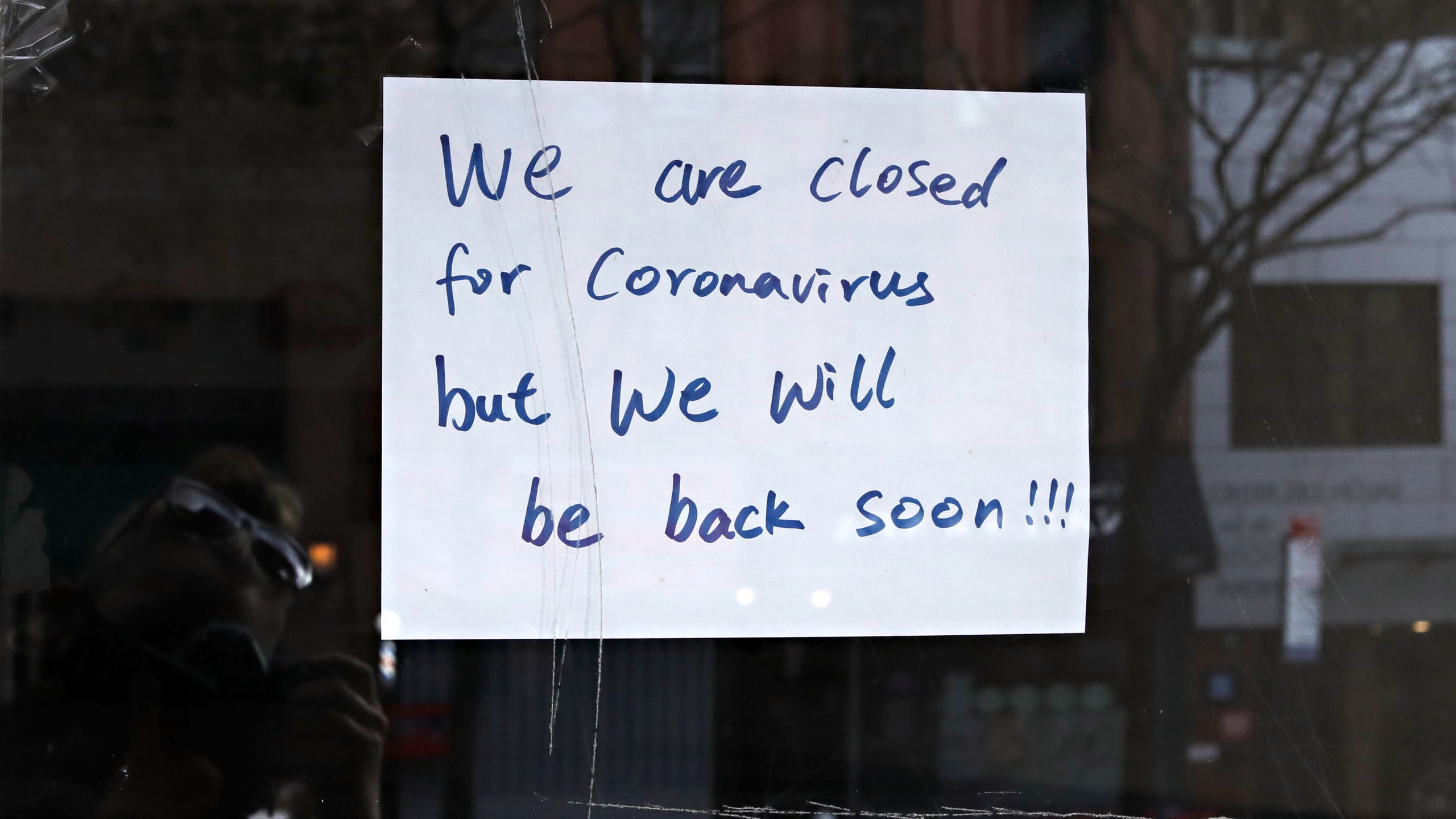 A sign in a restaurant window reads "we are closed for coronavirus but we will be back soon!!!" on April 21, 2020 in New York City. (Cindy Ord/Getty Images)