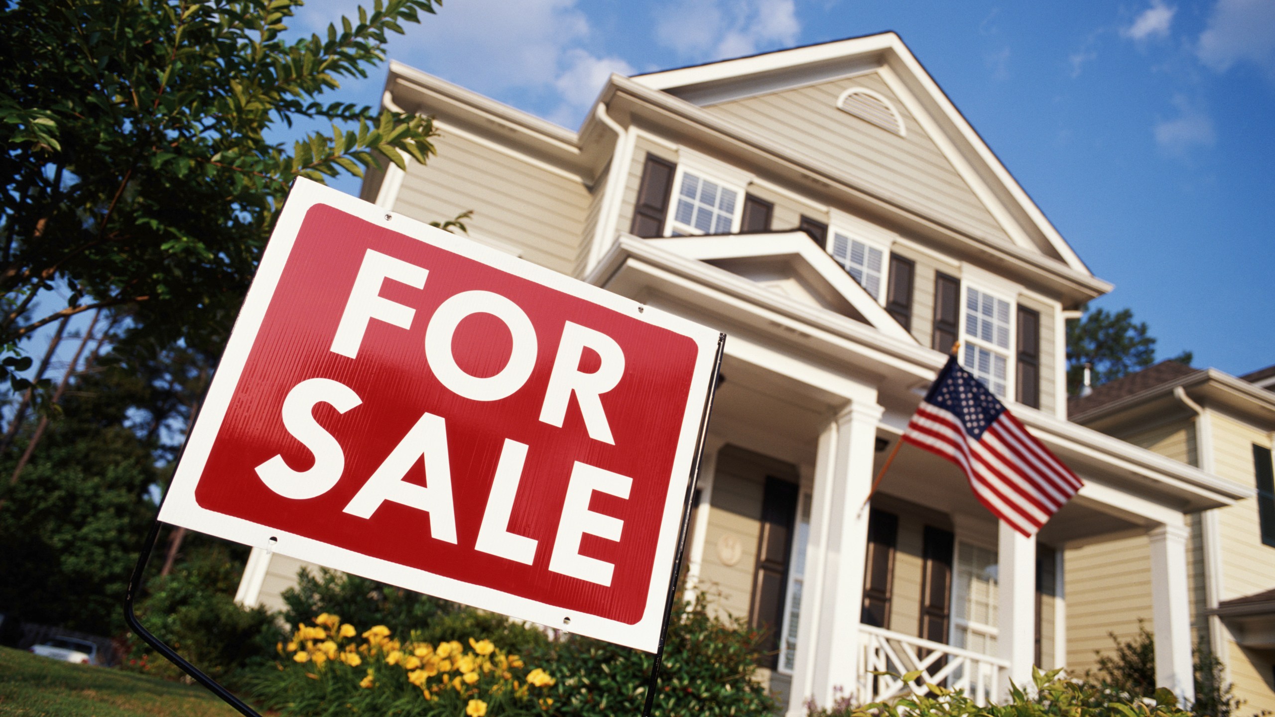 A "for sale" sign is seen outside a home in Georgia in this this file photo. (Getty Images)