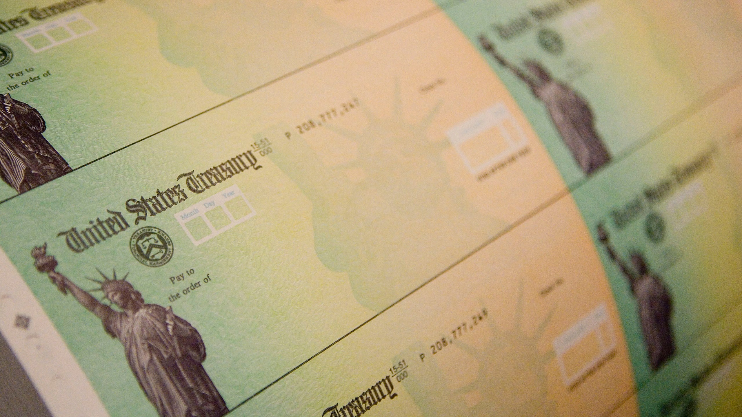 U.S. Treasury checks are prepared for printing in Philadelphia on May 8, 2008. (Jeff Fusco / Getty Images)