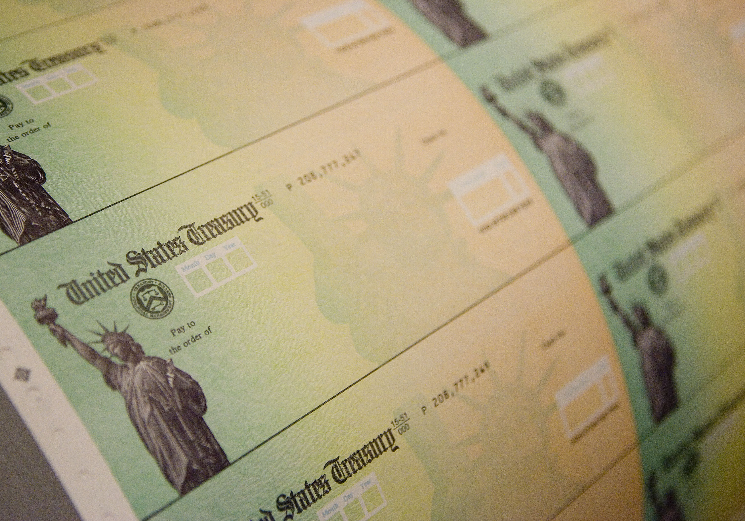 U.S. Treasury checks are prepared for printing in Philadelphia on May 8, 2008. (Jeff Fusco / Getty Images)