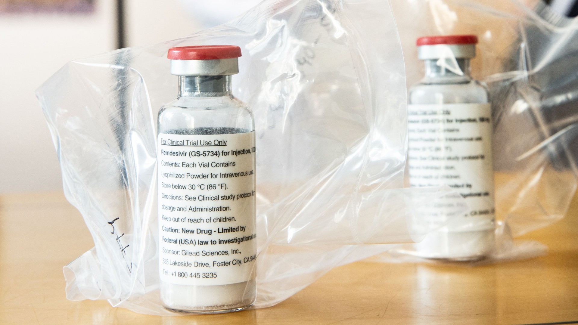 Vials of the drug remdesivir lie during a press conference about the start of a study with the Ebola drug in Hamburg, northern Germany on April 8, 2020. (ULRICH PERREY/POOL/AFP via Getty Images)