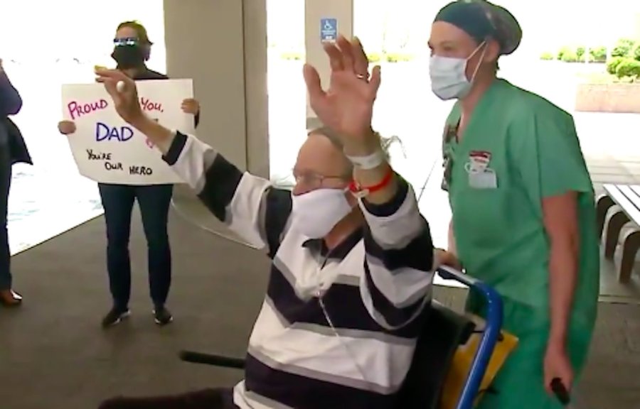 Staff members at St. Luke's Hospital in St. Louis County, Missouri lined a hallway and clapped for 87-year old Don Lochmoeller as he was discharged April 9, 2020. (KMOV via CNN)