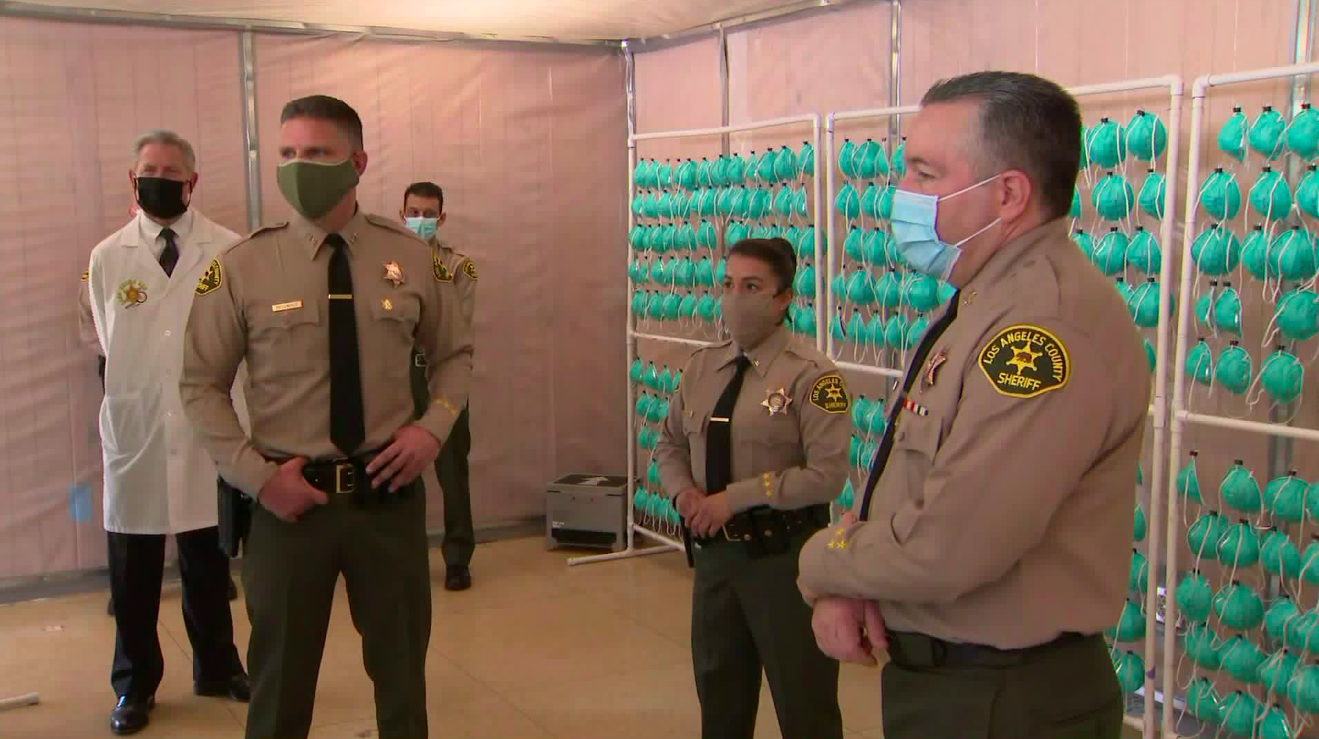 Los Angeles County Sheriff Alex Villanueva and other officials offer a tour on April 27, 2020 of the Sybil Brand Institute in Monterey Park where N95 masks will be decontaminated for reuse by first responders. (Pool)