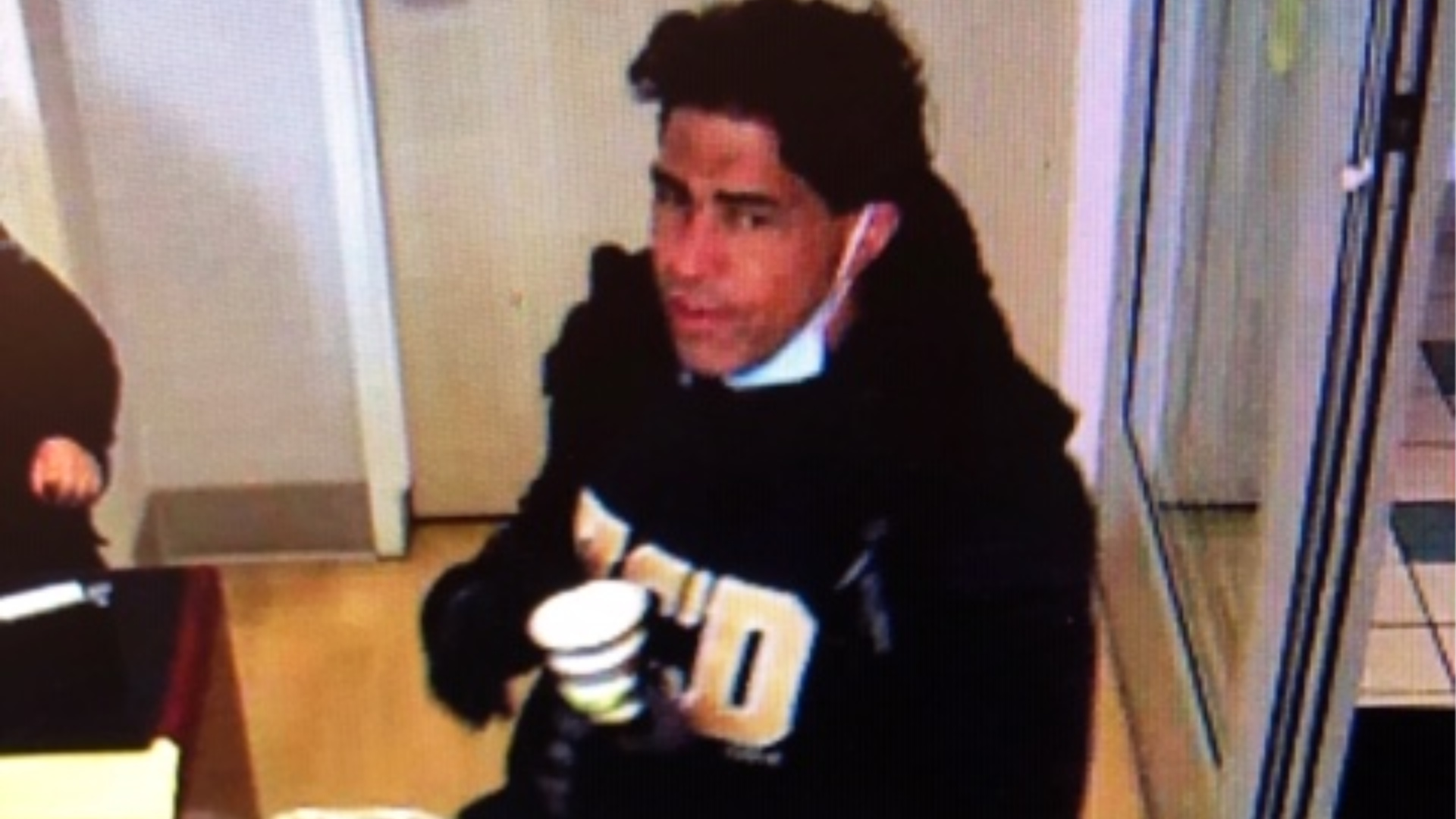 A surveillance image shows a man suspected of stealing a COVID-19 sample from a Davis hospital. (Davis Police via KTXL)