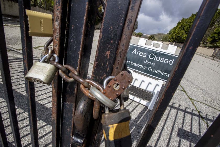 Padlocks seal a gate for the Victory Trailhead at the Upper Las Virgenes Open Space Preserve in Woodland Hills.(Brian van der Brug / Los Angeles Times)