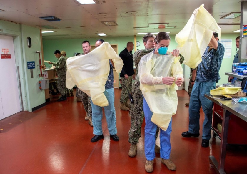 Sailors prepare to admit the first patient aboard the hospital ship Mercy on March 29. (Petty Officer 2nd Class Abigayle Lutz / U.S. Navy via L.A. Times)