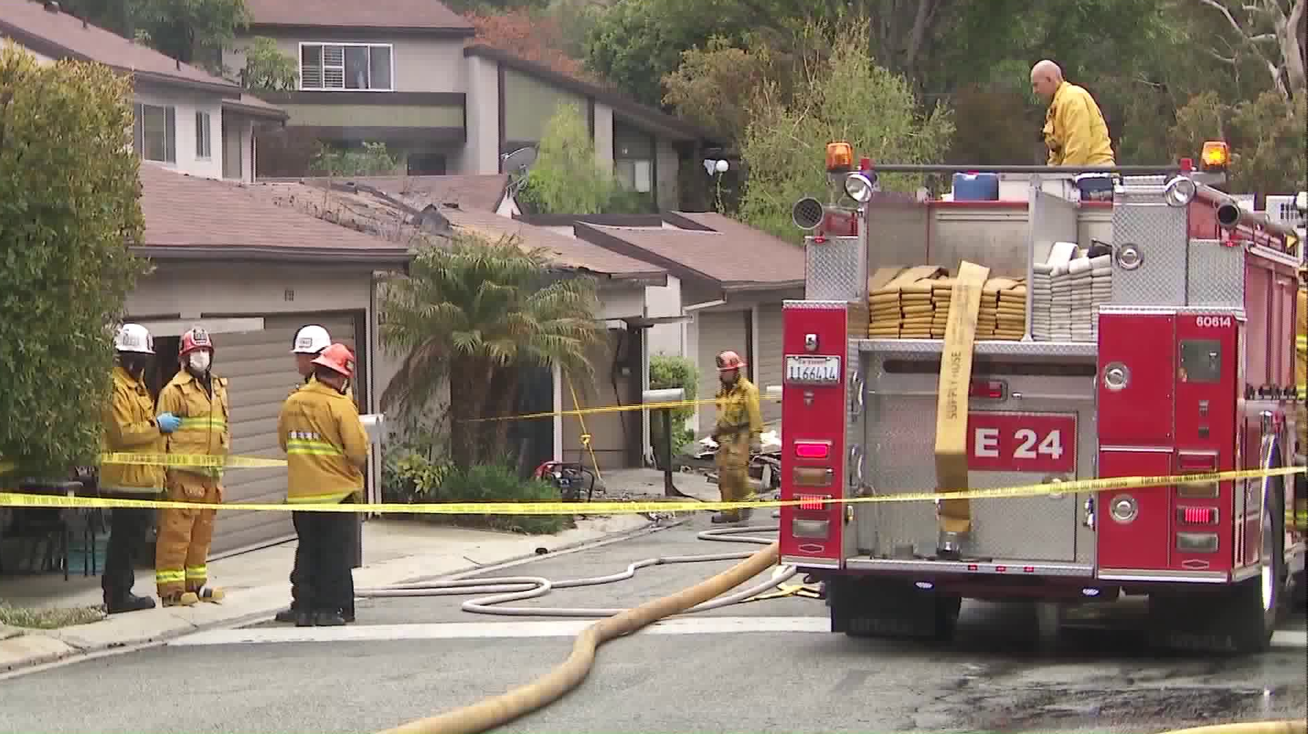 Crews respond to a deadly blaze at a townhouse in Sunland on April 13, 2020. (Credit: KTLA)