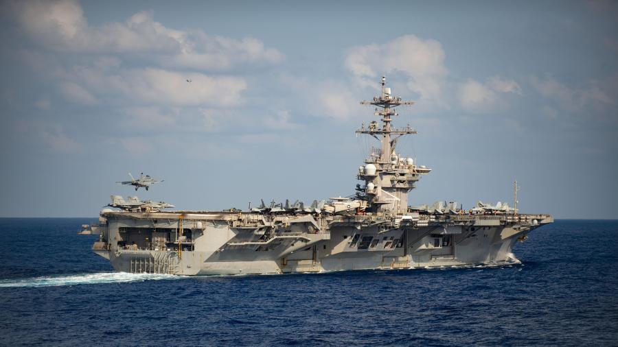 An F/A-18F Super Hornet, assigned to the Black Knights of Strike Fighter Squadron 154, lands on the flight deck of the aircraft carrier USS Theodore Roosevelt, March 18, 2020. (U.S. Navy photo by Mass Communication Specialist 3rd Class Nicholas V. Huynh/Released)