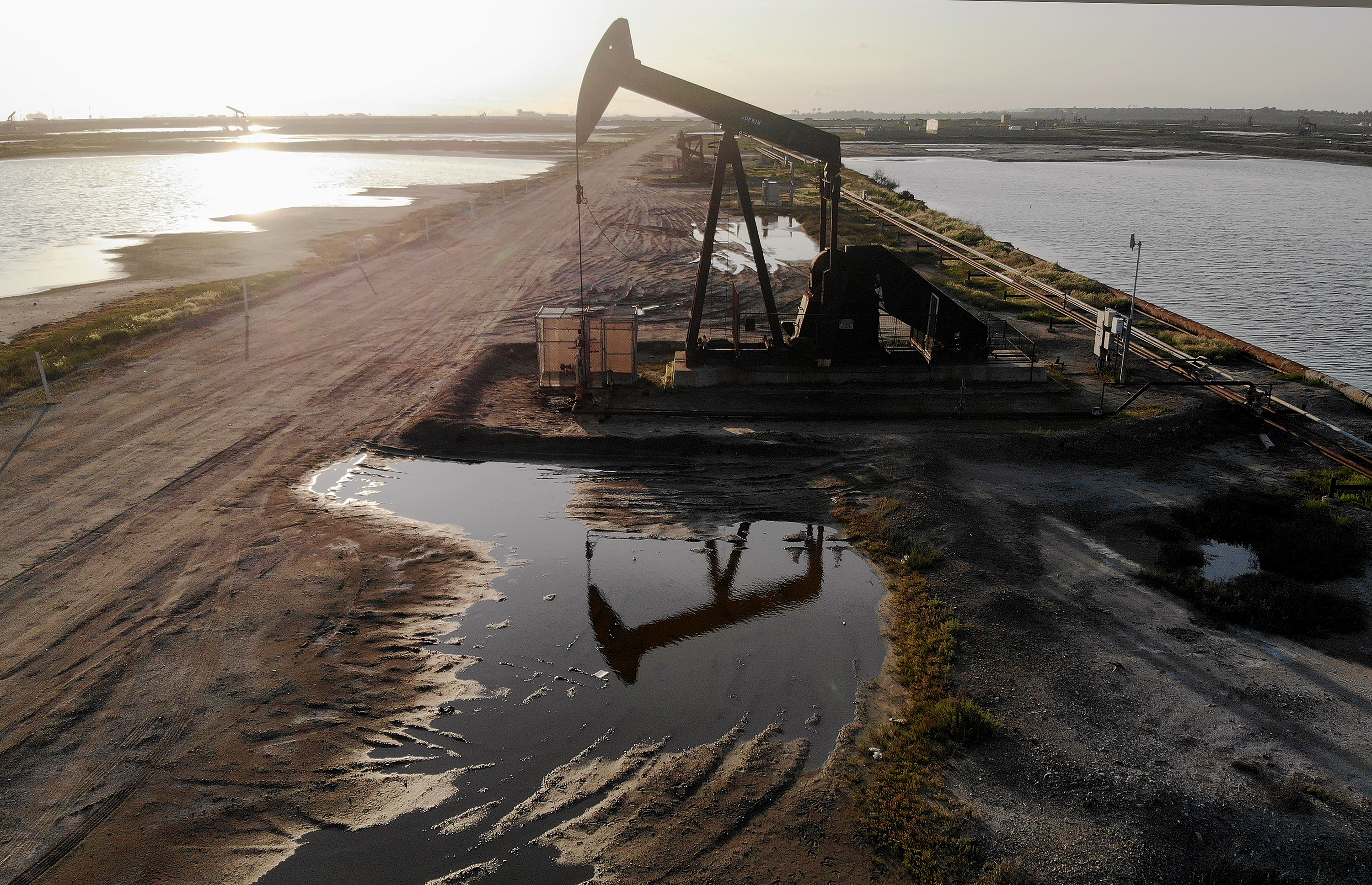 An aerial view shows an oil pumpjack at the Huntington Beach Oil Fields amidst the coronavirus pandemic on April 20, 2020 in Huntington Beach, California. Oil prices traded in negative territory for the first time as the spread of coronavirus impacts global demand. (Mario Tama/Getty Images)