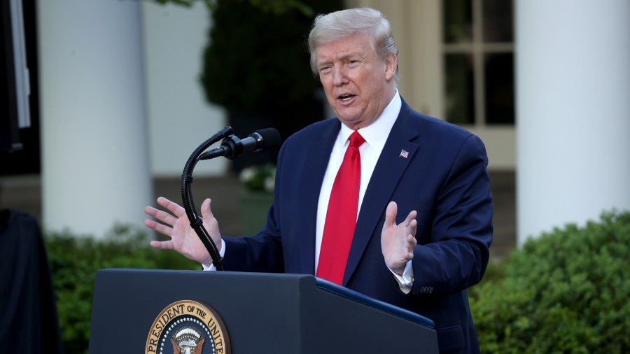 U.S. President Donald Trump answers questions during the daily briefing of the coronavirus task force in the Rose Garden of the White House on April 27, 2020 in Washington, DC. (Win McNamee/Getty Images)