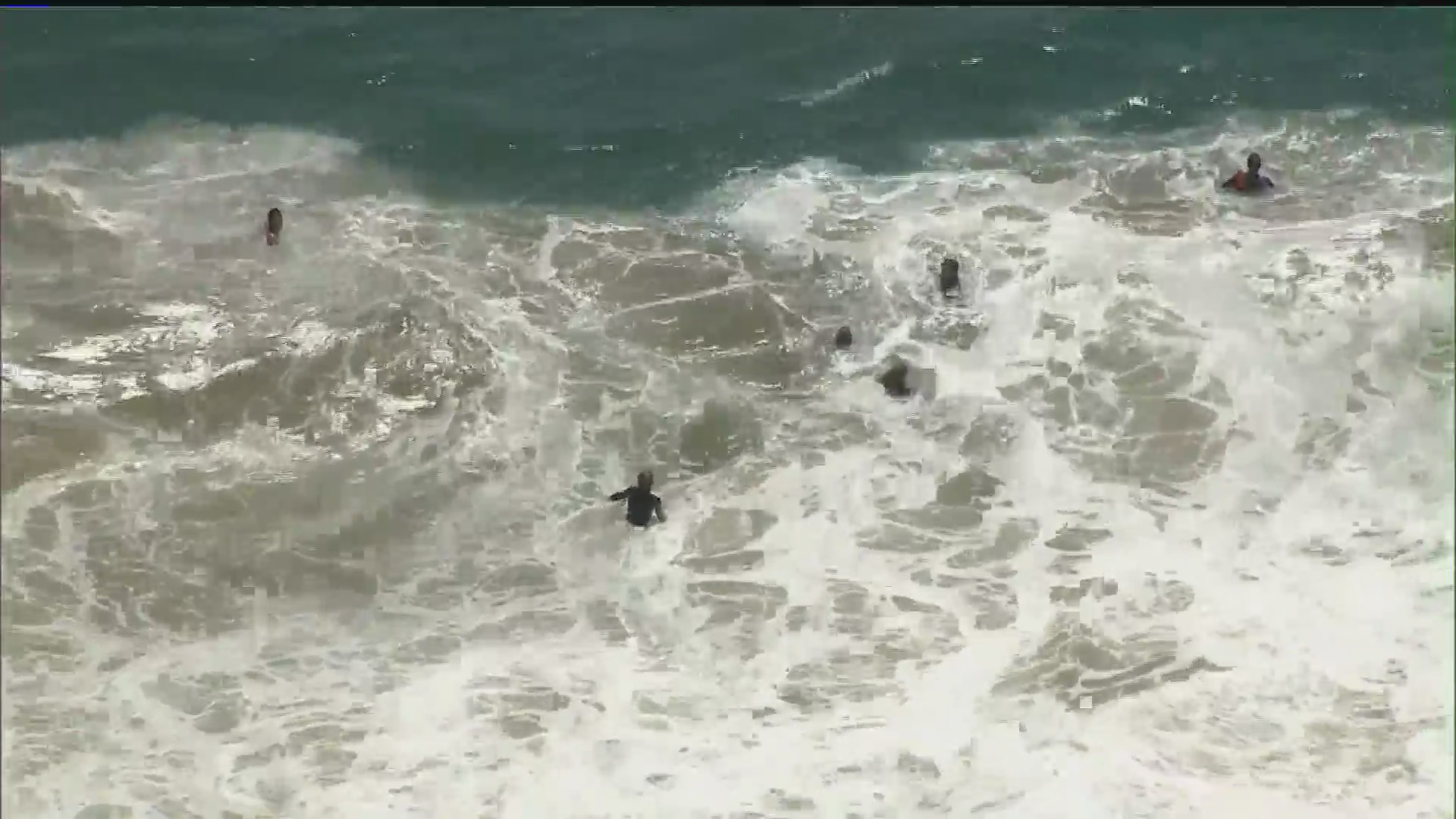 Surfers are seen at the Wedge in this file photo. (KTLA)