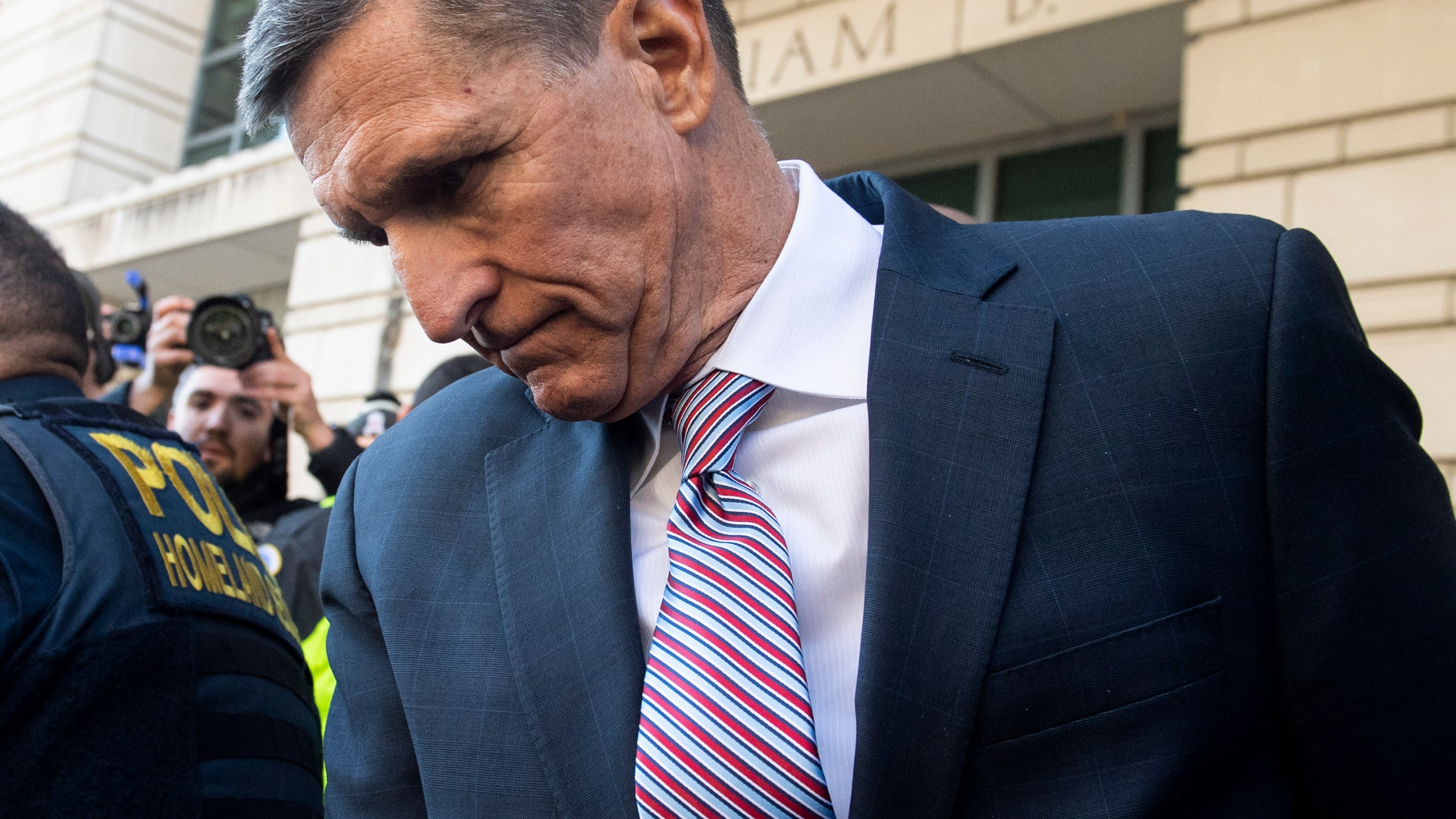 Former National Security Advisor General Michael Flynn leaves after the delay in his sentencing hearing at U.S. District Court in Washington, D.C., on Dec. 18, 2018. (SAUL LOEB/AFP via Getty Images)