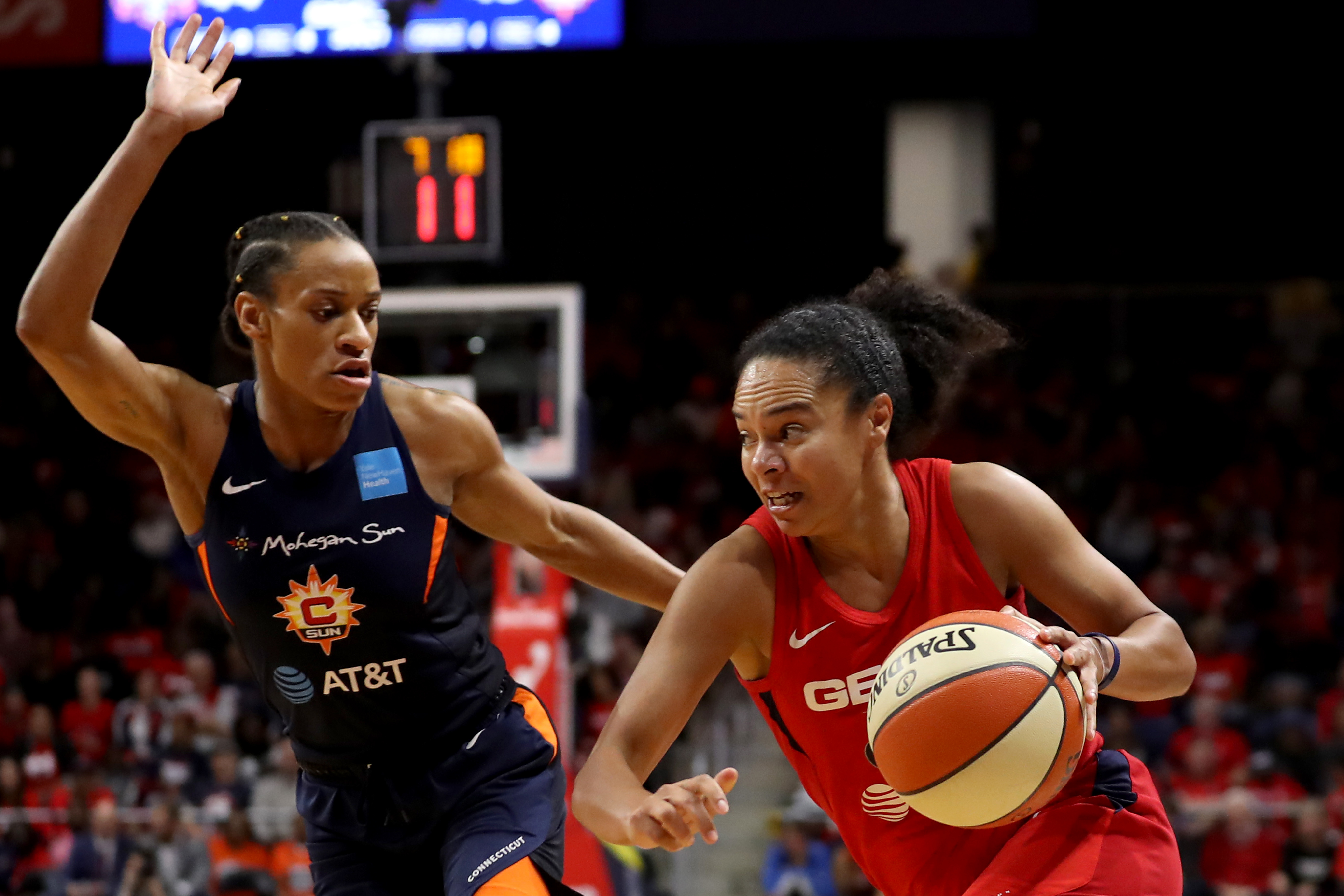 Kristi Toliver of Washington Mystics drives against Jasmine Thomas of Connecticut Sun during Game Five of the 2019 WNBA Finals at St Elizabeths East Entertainment & Sports Arena on October 10, 2019, in Washington, DC. (Rob Carr/Getty Images)