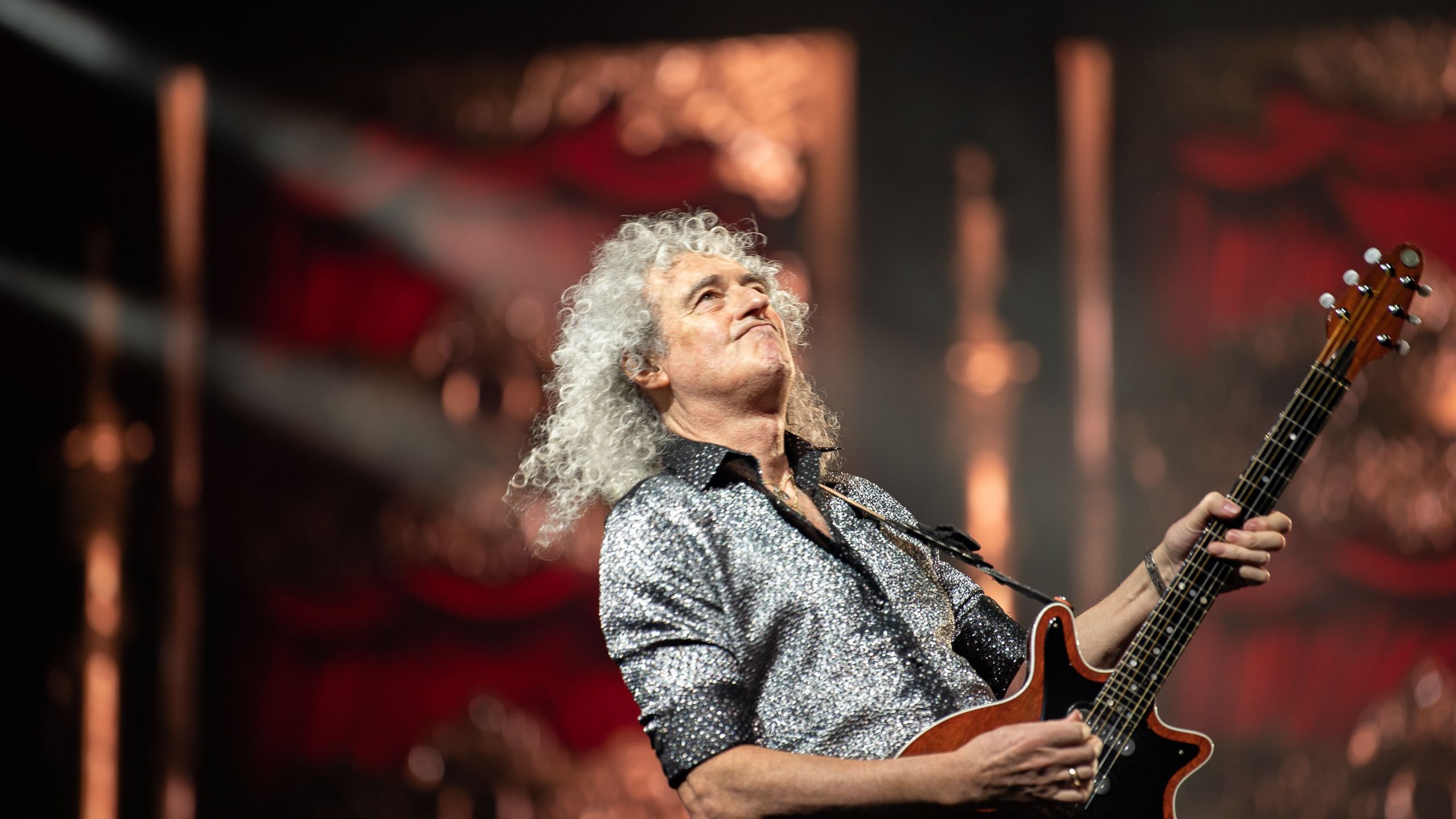 In this photo taken on January 18, 2020, Queen guitarist Brian May performs during the Queen + Adam Lambert concert in Seoul. (YELIM LEE/AFP via Getty Images)