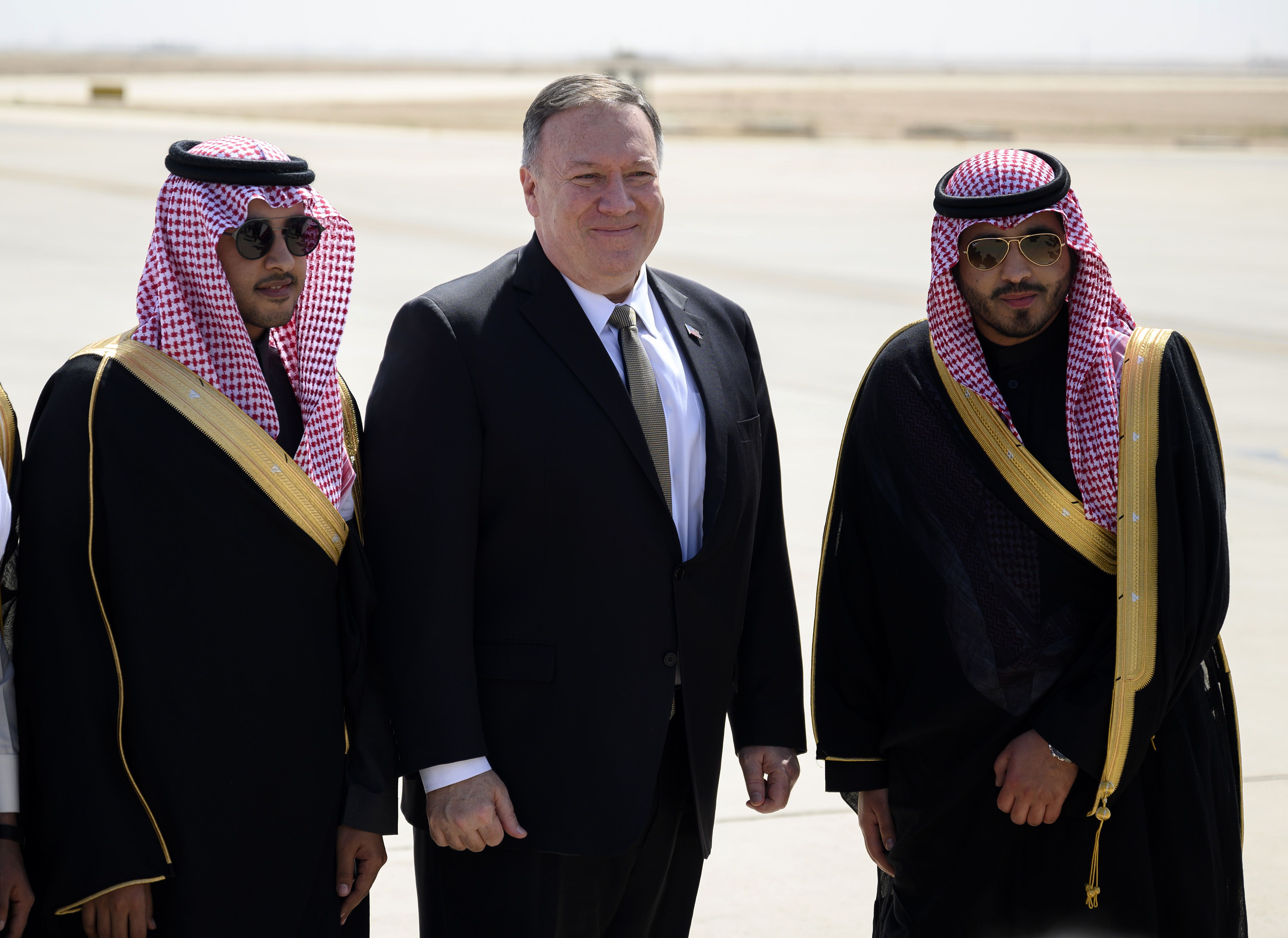 Saudi Undersecretary for Protocol Affairs Azzam bin AbdulKarim Al-Gain waves to U.S. Secretary of State Mike Pompeo off as he boards a plane at the King Khalid International Airport in the Saudi capital Riyadh, before his departure on Feb. 21, 2020. (ANDREW CABALLERO-REYNOLDS/AFP via Getty Images)