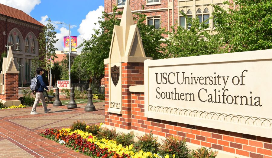 A student wears a face mask at the University of Southern California in Los Angeles on March 11, 2020. (Frederic J. Brown / AFP / Getty Images)