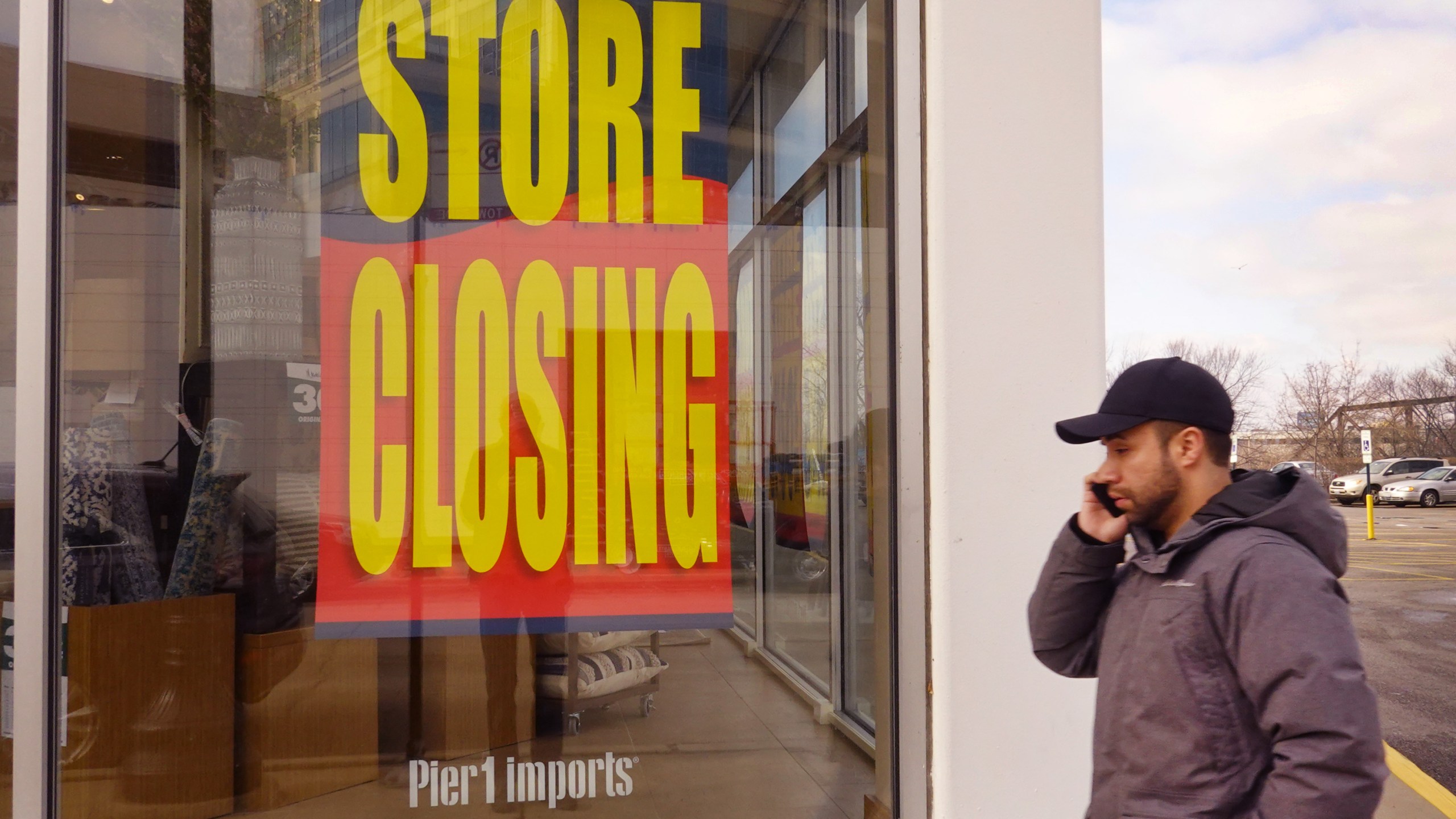 Store closing signs hang in the window of a Pier 1 imports store on February 18, 2020 in Chicago, Illinois. (Scott Olson/Getty Images)