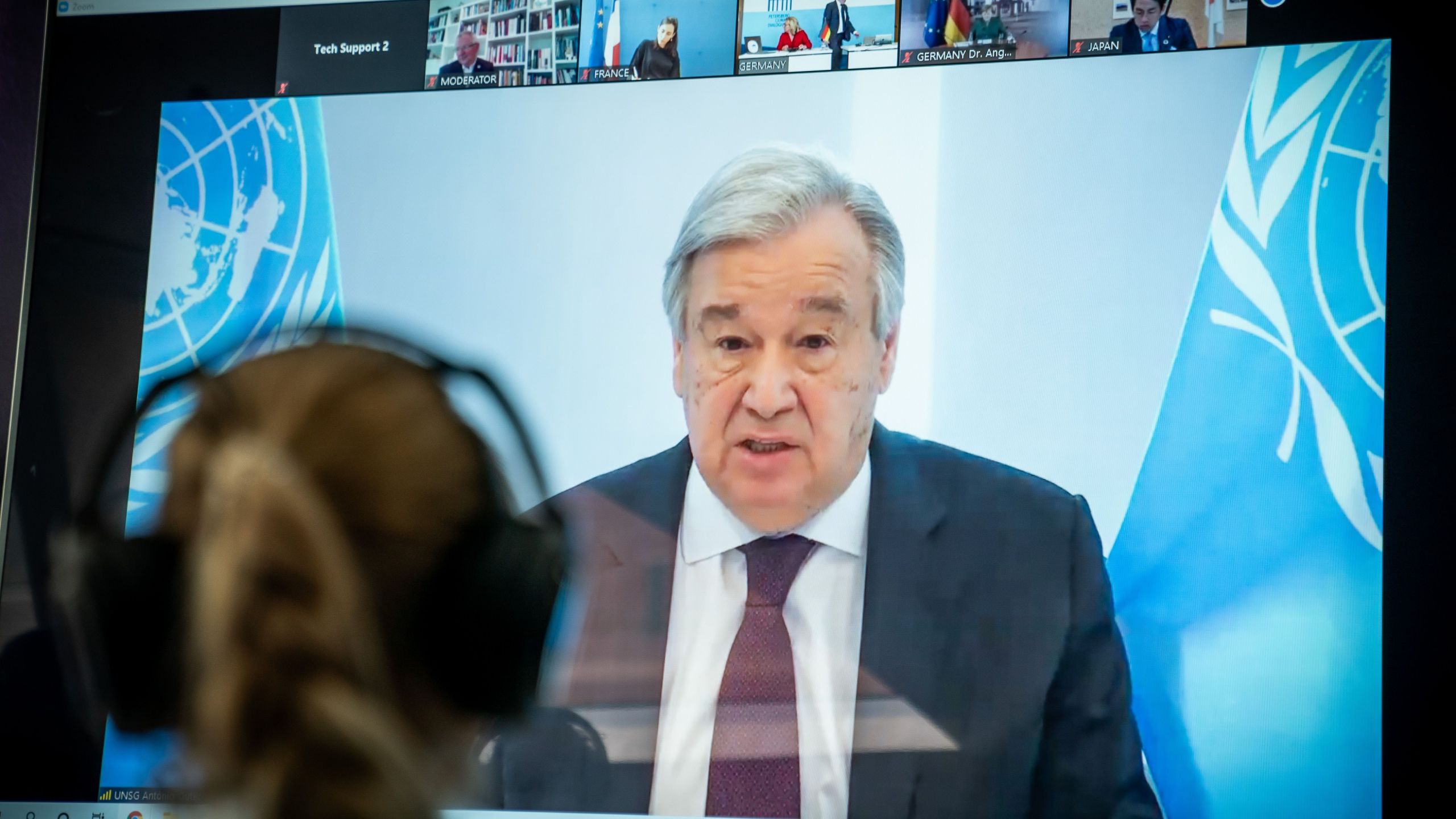 United Nations Secretary-General Antonio Guterres is seen on a screen during the video conference of the Petersberg Climate Dialogue in Berlin on April 28, 2020. (MICHAEL KAPPELER/POOL/AFP via Getty Images)