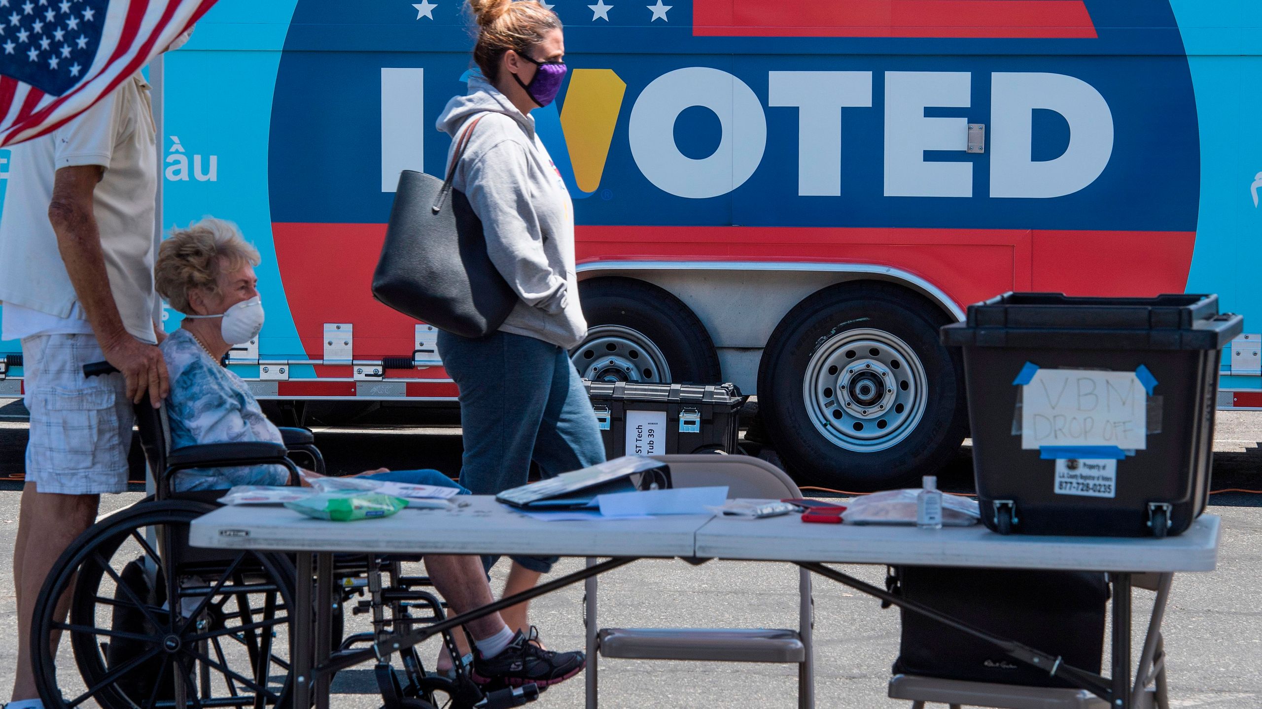 People wait to cast their votes at a polling station for the special election between Democratic state assemblywoman Christy Smith and Republican businessman and ex-Navy pilot Mike Garcia to replace former Democratic Congresswoman Katie Hill in the state's 25th Congressional District, in Santa Clarita, California on May 12, 2020. (MARK RALSTON/AFP via Getty Images)