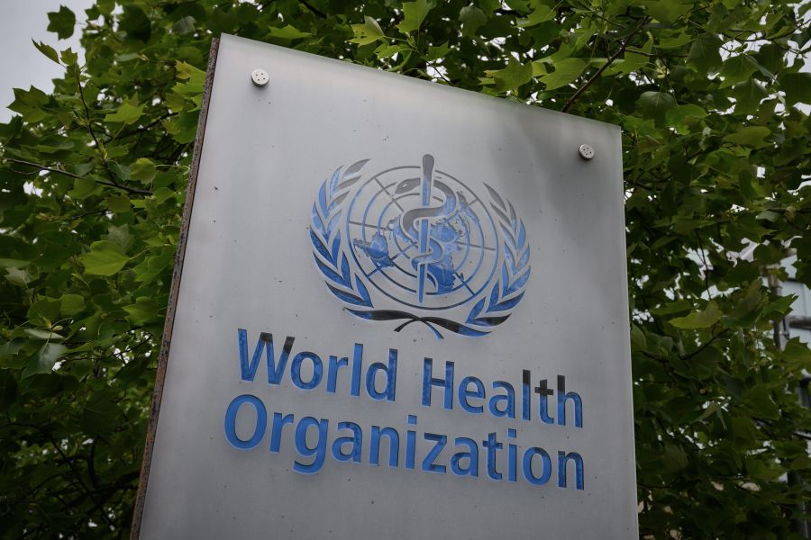 This picture taken on May 12, 2020, shows a sign of the World Health Organization in Geneva next to their headquarters. (FABRICE COFFRINI/AFP via Getty Images)