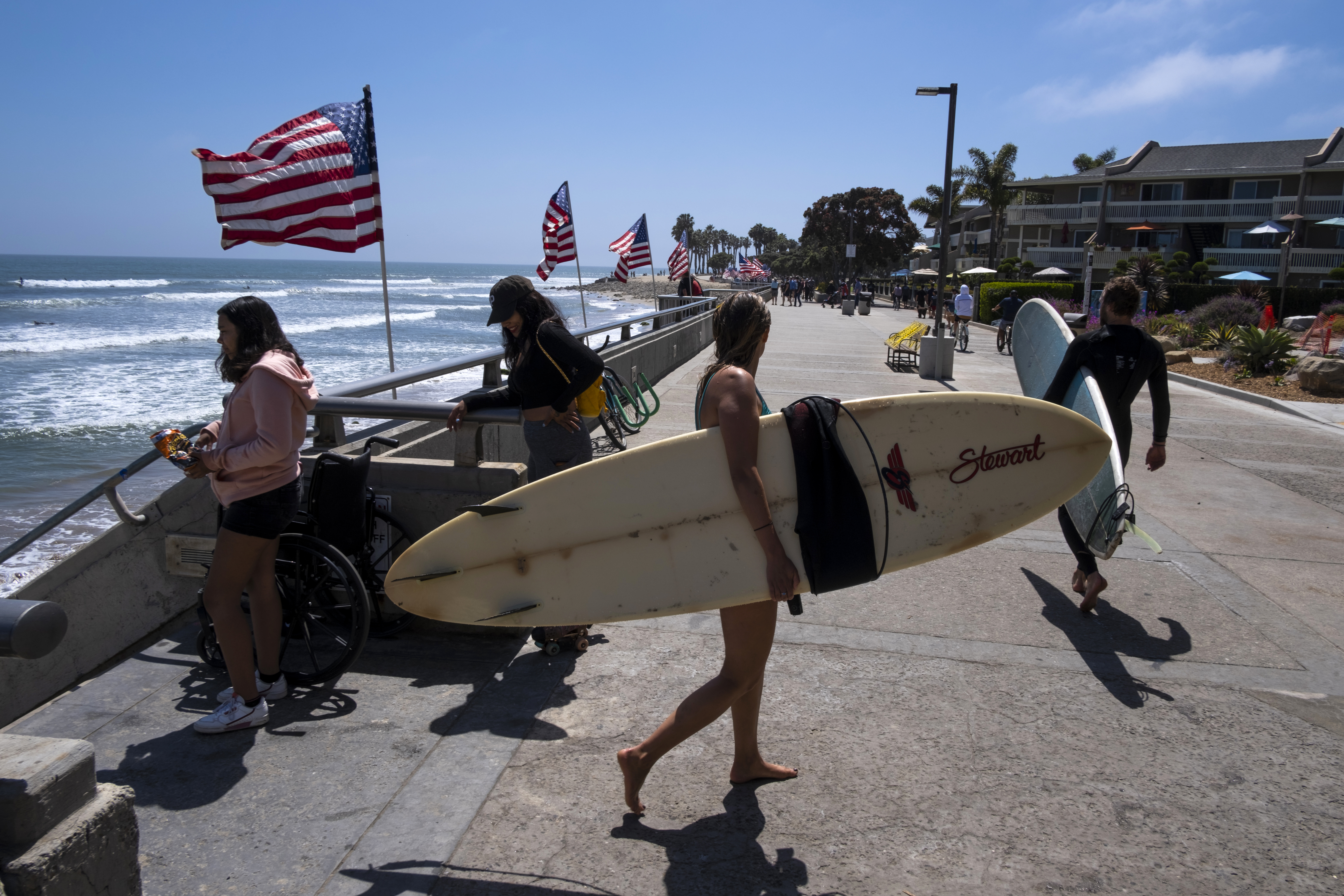 People enjoy the less restricted beachfront over Memorial Day weekend May 24, 2020 in Ventura. (Brent Stirton/Getty Images)