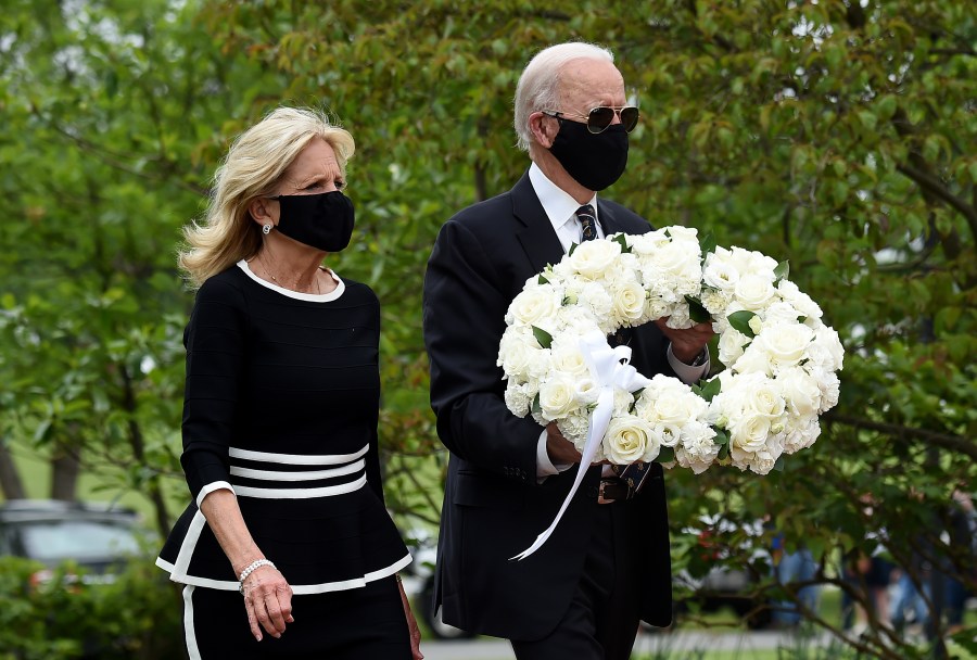 Joe and Jill Biden pay their respects to fallen service members on Memorial Day at Delaware Memorial Bridge Veteran's Memorial Park in Wilmington on May 25, 2020. (Olivier DOULIERY / AFP via Getty Images)